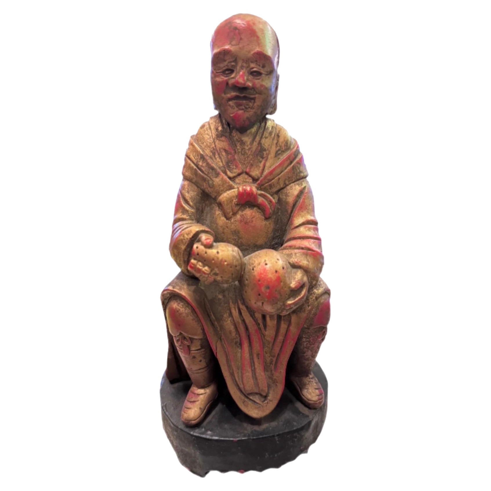 Antica scultura cinese in legno intagliato