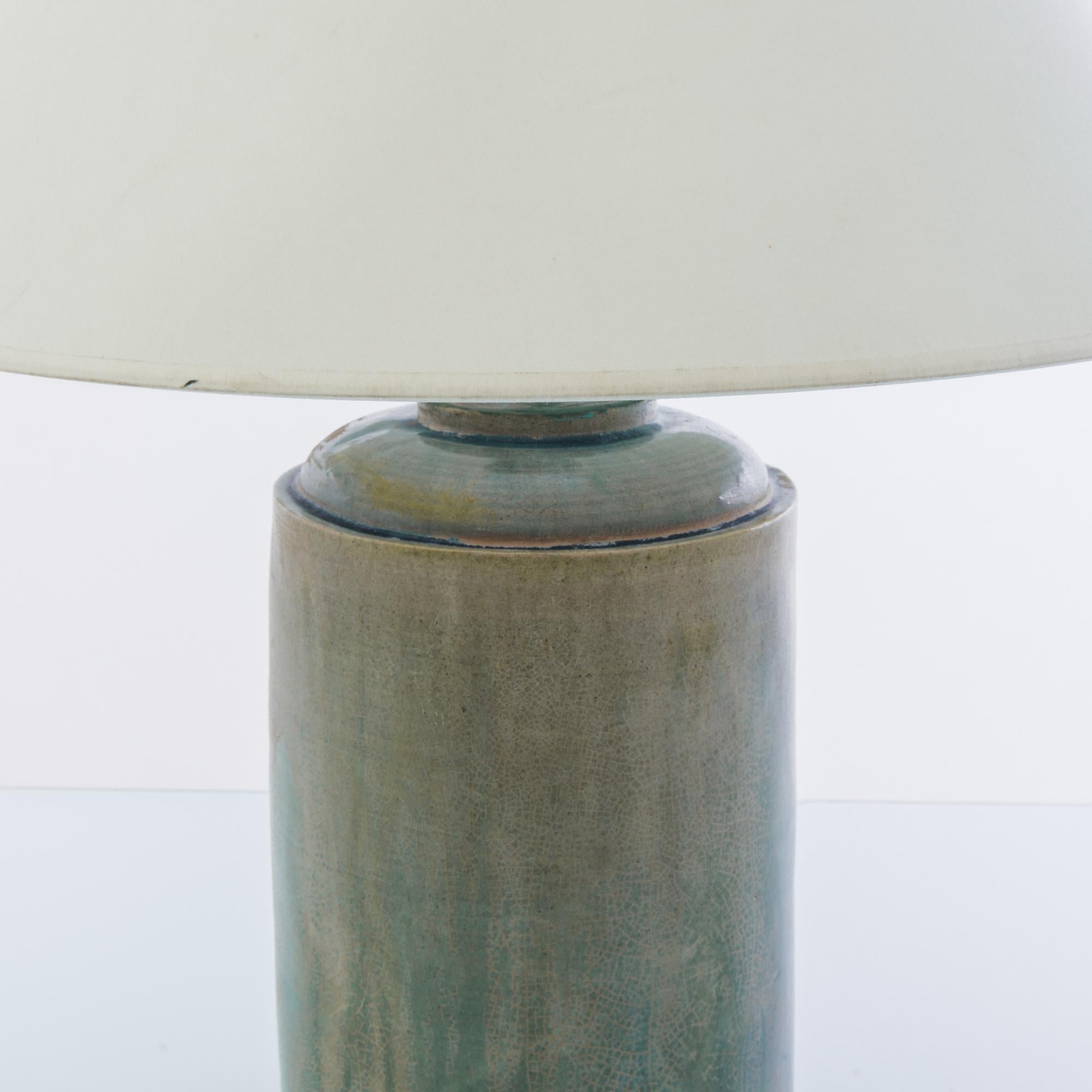 This finely crafted vintage Chinese vase has been fitted with an adjustable brass fixture and E26 lighting socket. Textured glazes, attractive colors and clean modern forms make this a great fit for neutral contemporary interiors. 24.4