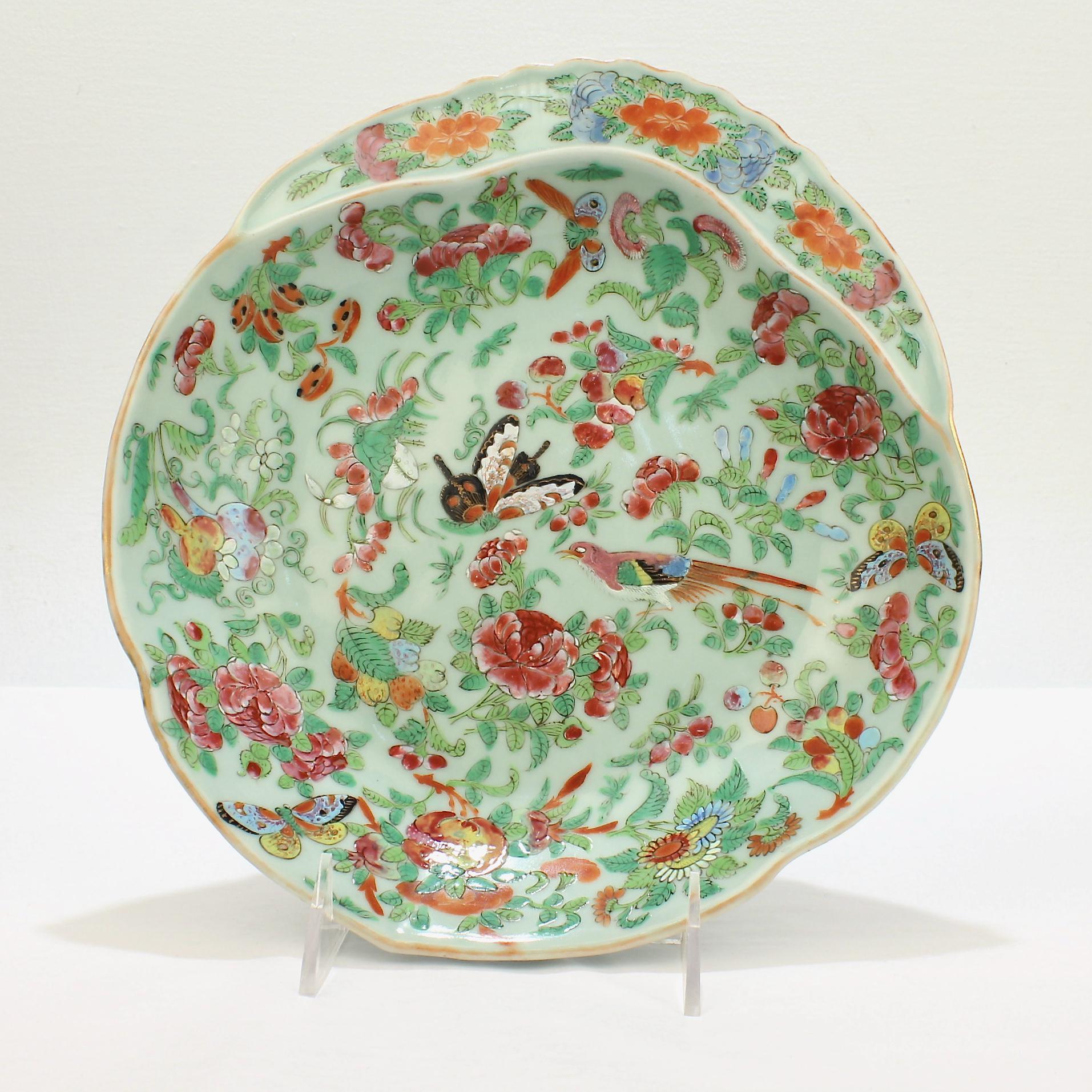 A very fine Chinese porcelain shrimp bowl.

With a celadon glaze and birds, butterflies, flowers, and foliage in painted enamel decoration throughout.

An excellent example!

Date:
Early 20th century or earlier

Overall condition:
It is in