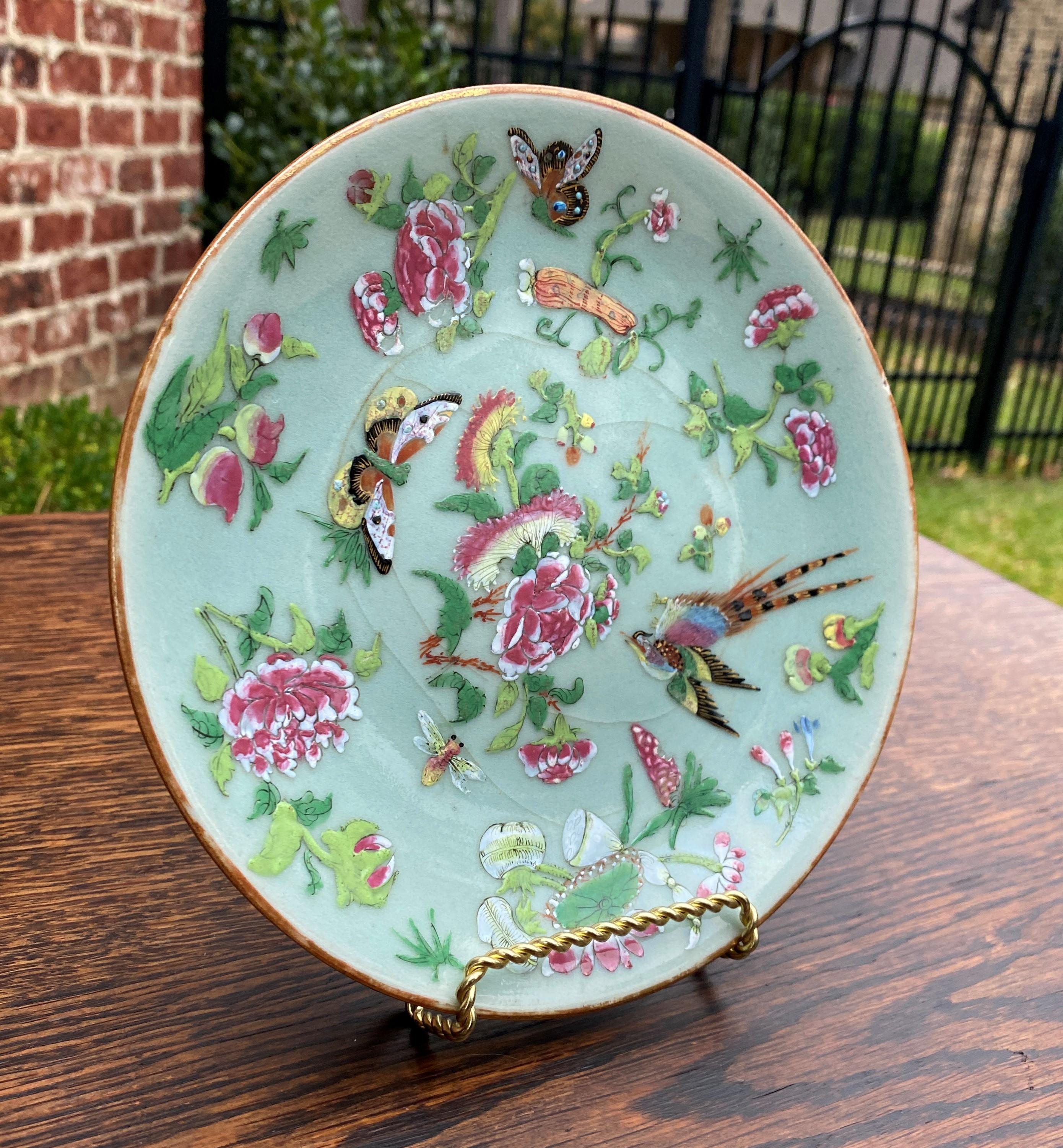 Antique Chinese Celadon plate #2~~Famille-Rose Palette~~Qing Dynasty~~c. 1820s

Beautiful antique Chinese (Canton) Celadon plate~~light green Celadon glaze with beautifully hand painted decoration in over-glaze poly-chrome enamels of the