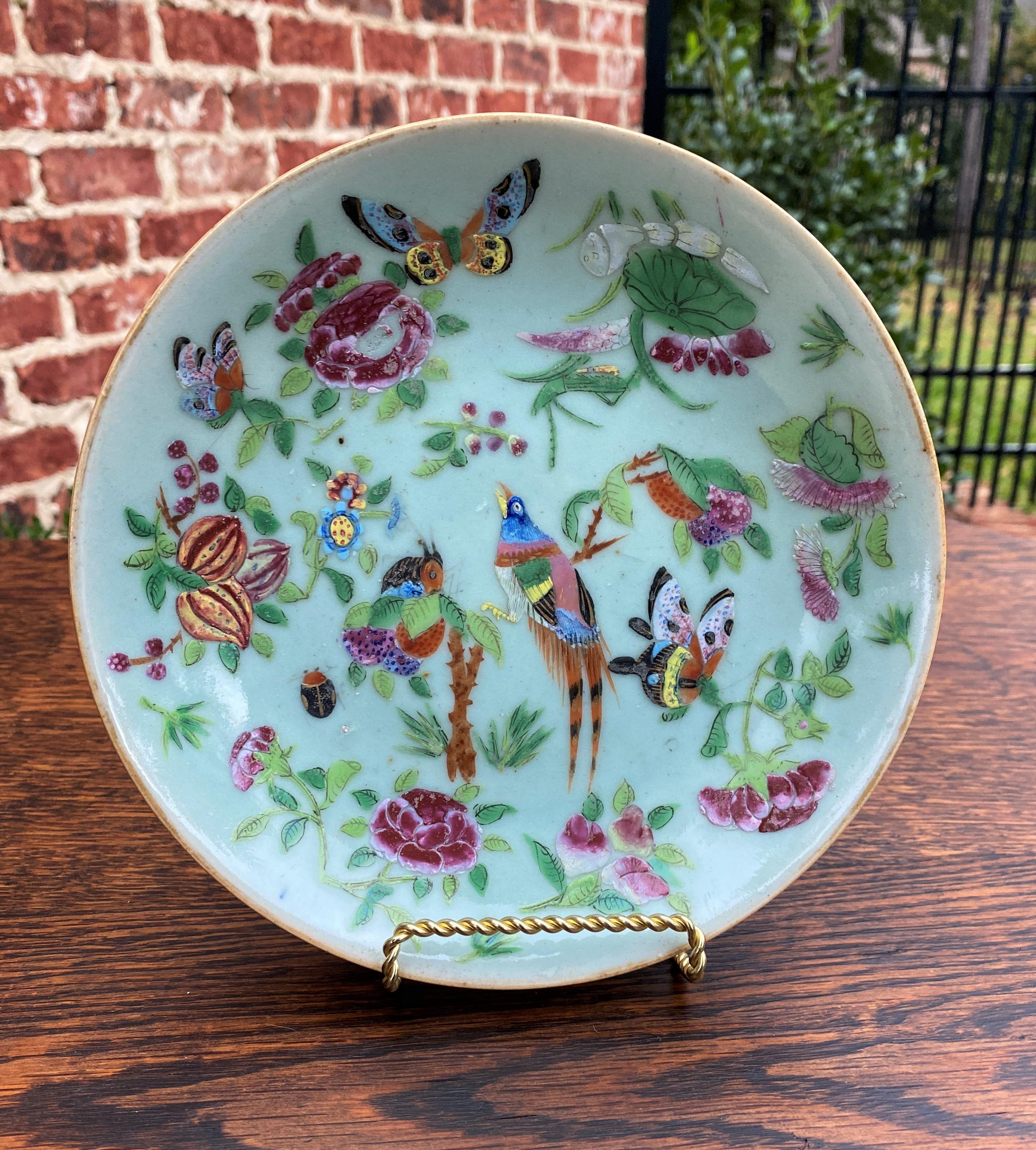 Antique Chinese Celadon plate #4~~Famille-Rose Palette~~Qing Dynasty~~c. 1820s

Beautiful antique Chinese (Canton) Celadon plate~~light green Celadon glaze with beautifully hand painted decoration in over-glaze poly-chrome enamels of the