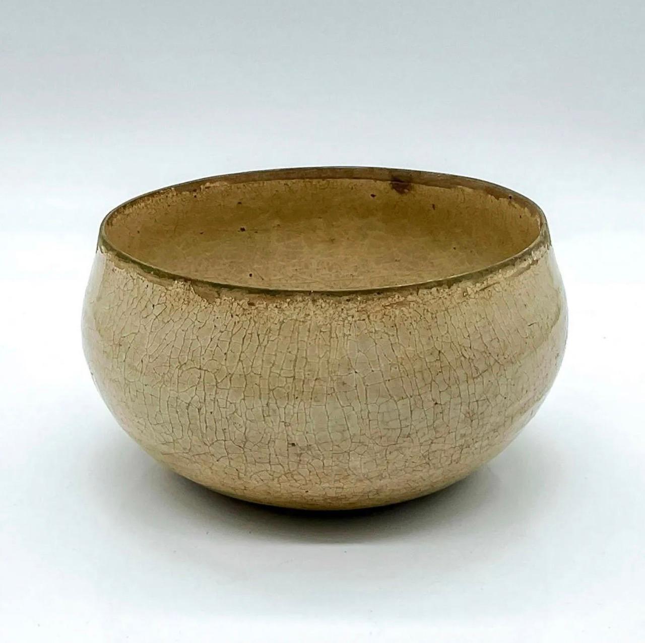 Antique Chinese ceramic Celadon bowl

Showing a beautiful patina, this bowl is an excellent version of an early Celadon bowl. 

Likely from the Eastern Han Dynasty period (25-220).

The term ‘celadon ware’, also known as green ware, refers to