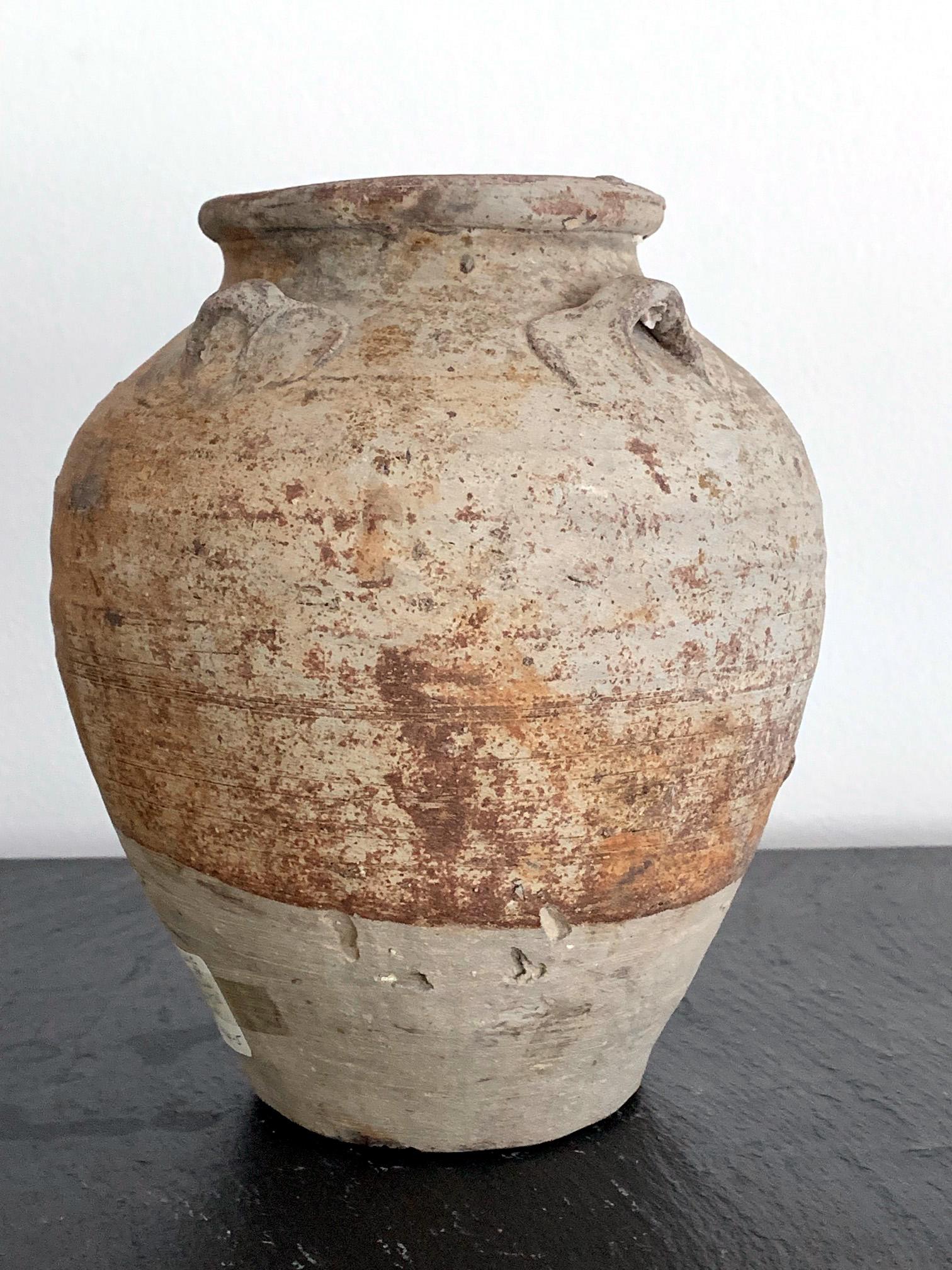 A stone ware pottery jar used for storage, made in southern China Fujian or Guangdong province since Song Dynasty for domestic use as well as export. They were widely exported to South East Asia and further, and sometimes known as Martaban Jars due