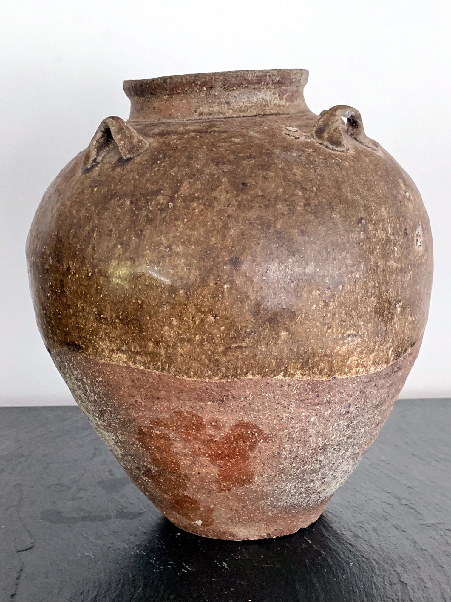 A stoneware pottery jar used for storage, made in southern China Fujian or Guangdong province since Song Dynasty for domestic use as well as export. They were widely exported to South East Asia and further afield, and sometimes known as Martaban