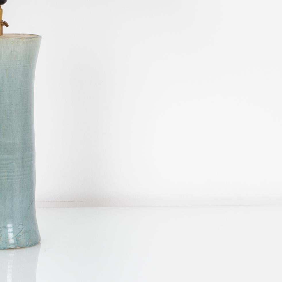 This finely crafted vintage Chinese vase has been fitted with modern brass adjustable fixture and E26 lighting socket. Textured glazes, attractive colors and clean modern forms make this a great fit for neutral contemporary interiors. 29