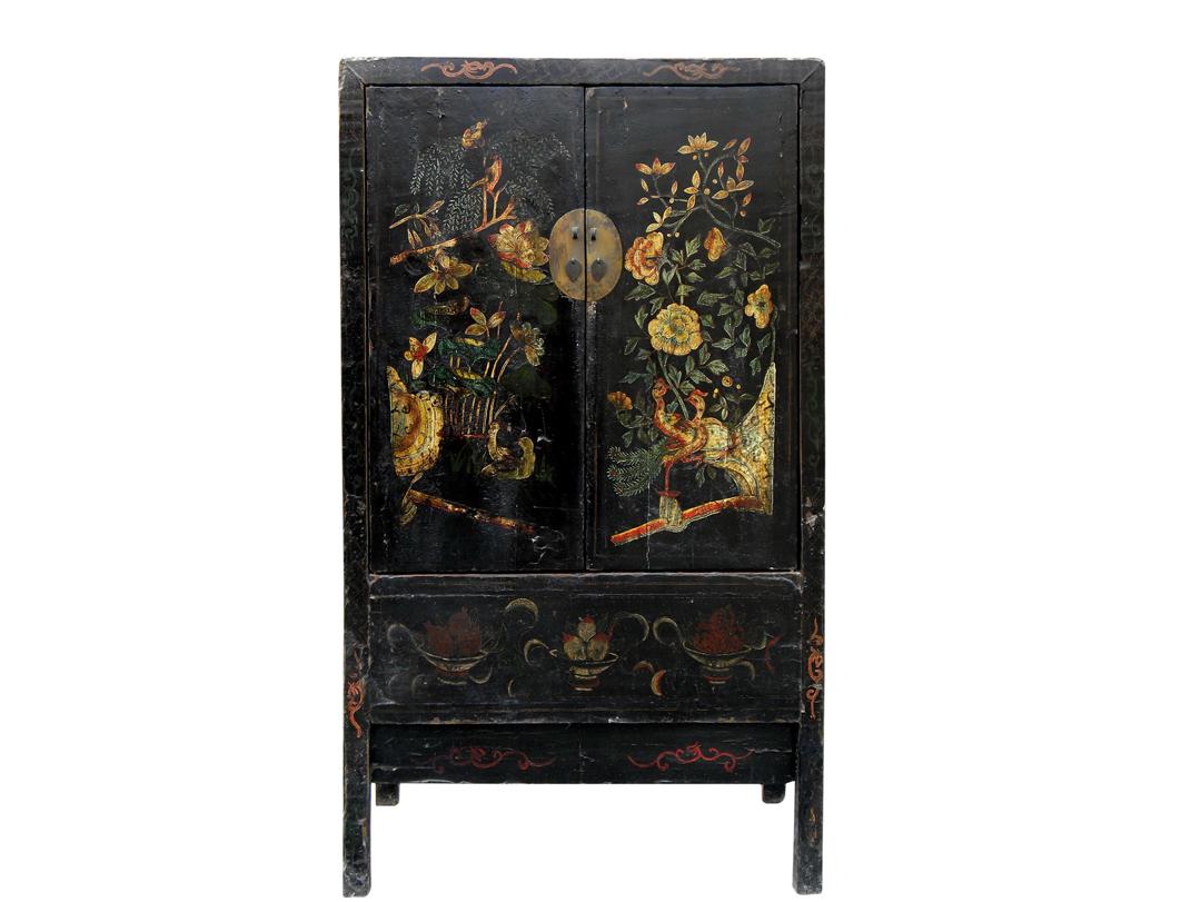 This striking Chinese chinoiserie cabinet was retrieved from Shanxi Province, a centuries old mountain city located in the Northern China. This cabinet is one of 3 rare finds. It was used to store either wardrobe or bed ware such as comforters or