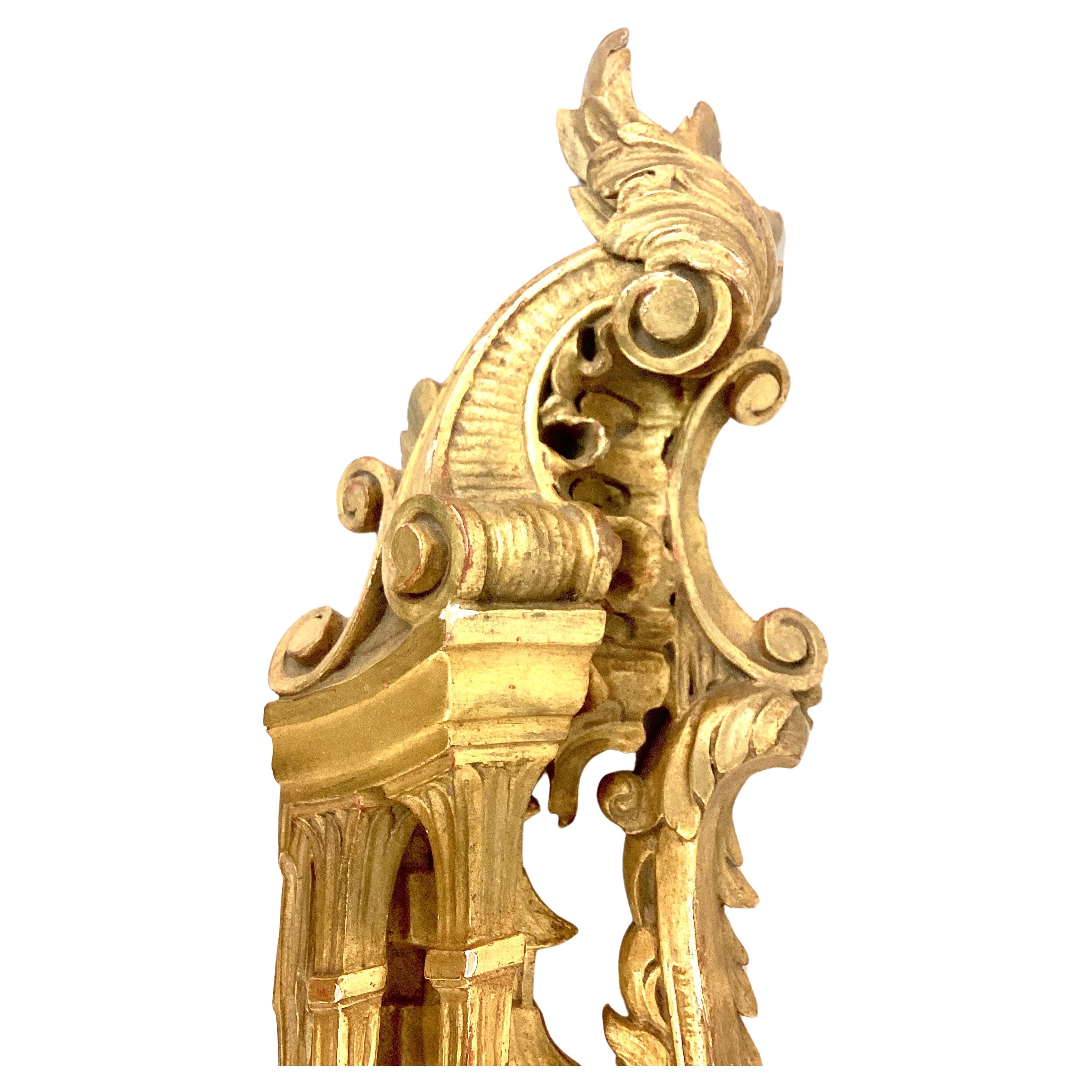 19th century Chinese Chippendale giltwood architectural fragment. Piece is made up of leaves and scroll motif with Chinese accents in center. Intricately hand-carved. Fitted with a hanger on back.