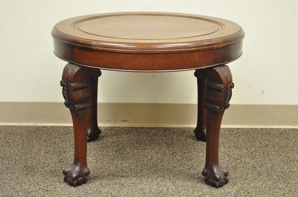 Antique Chinese Chippendale style ball and claw foot carved Mahogany side table. Item features solid mahogany construction, carved ball and claw feet, and figured burl wood top, circa early to mid 1900s. Measurements: 20