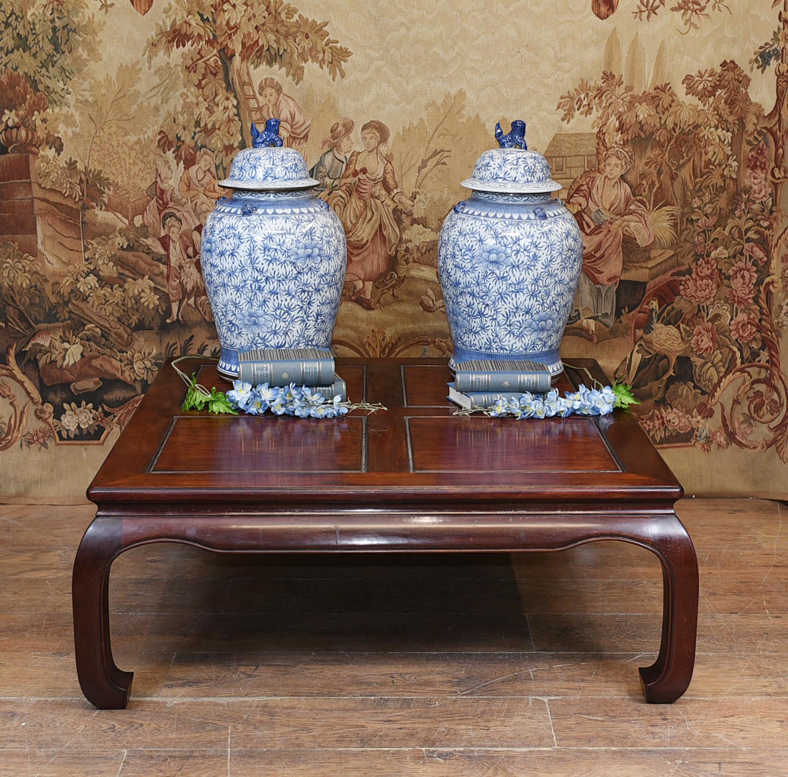 Gorgeous antique Chinese coffee table in hardwood
Clean design great for modern interiors
Circa 1930
Blue and white porcelain urns available but not included
Viewings available by appointment
Offered in great shape ready for home use right