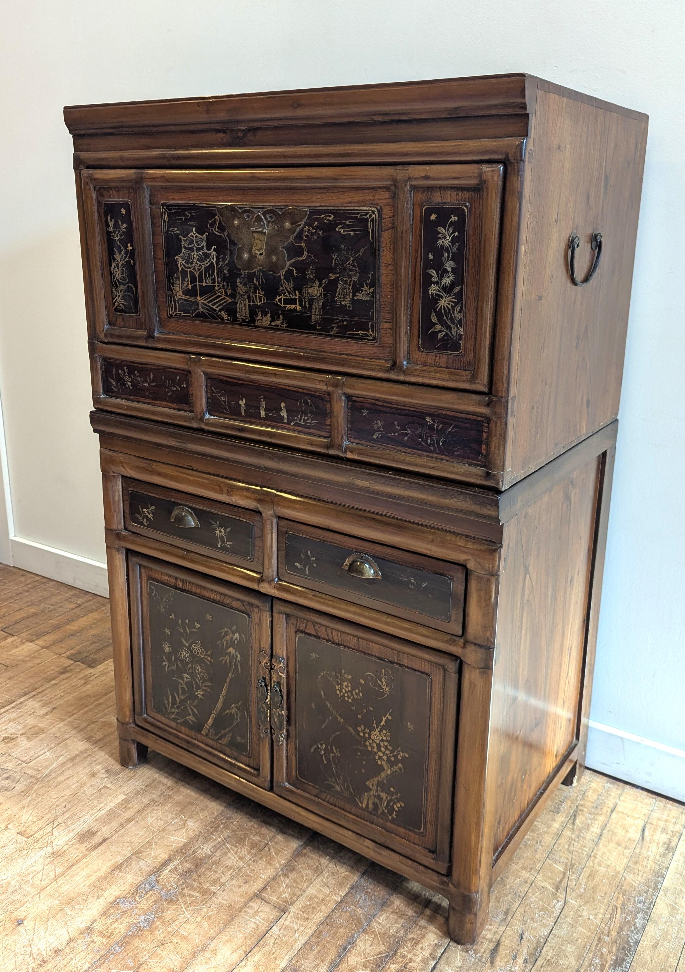 Antique Chinese Compartment Cabinet with removable top chest.  Made of Cypress wood with hand painting, a two part compartment cabinet with lower cabinet having two drawers with the removable top cabinet having two shelfs with removable door panel. 