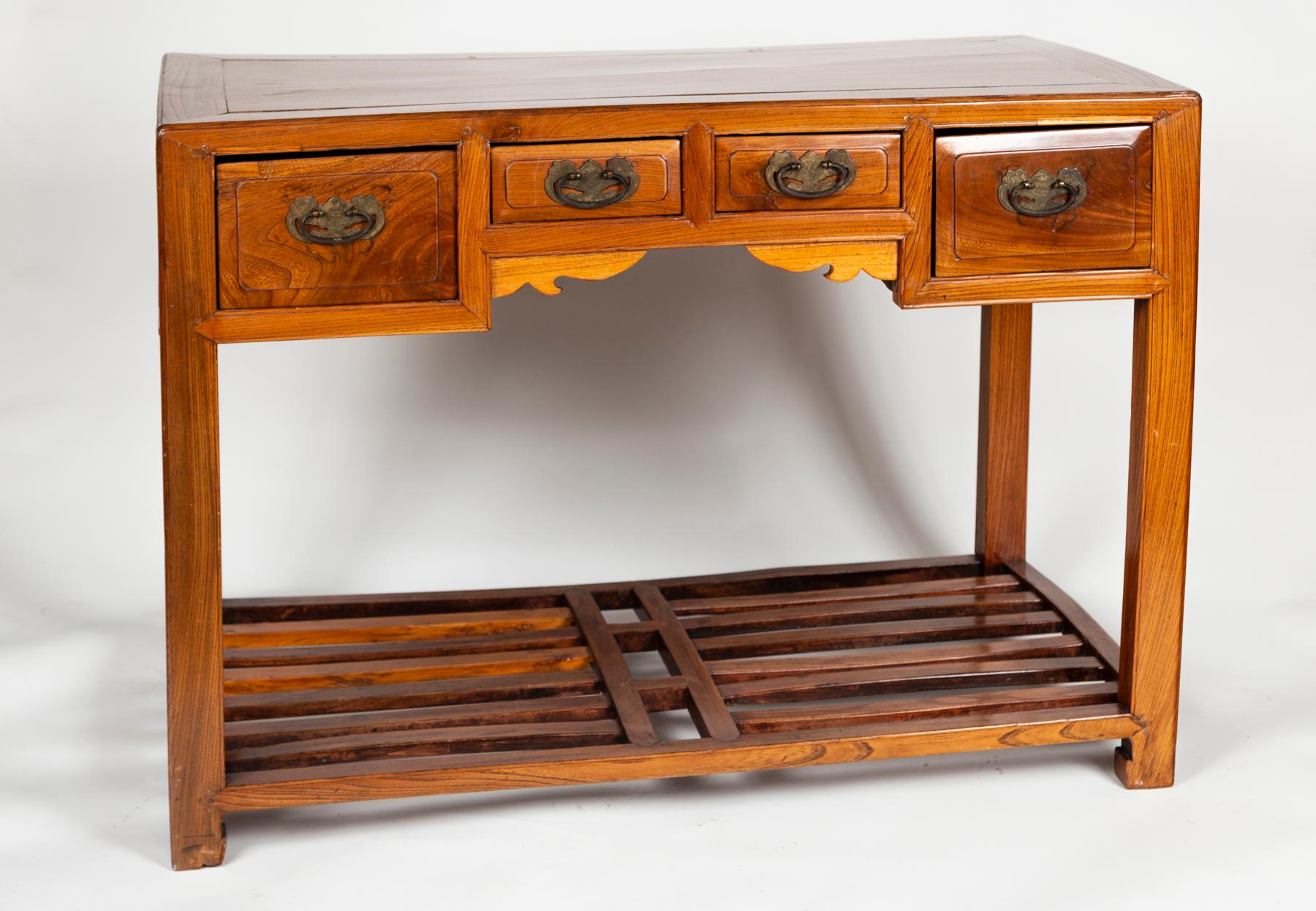 Antique Chinese Console Table, 20th Century. Rectangular table with four drawers with original hardware and lower shelf. Provincial Chinese design with lacquered finish.