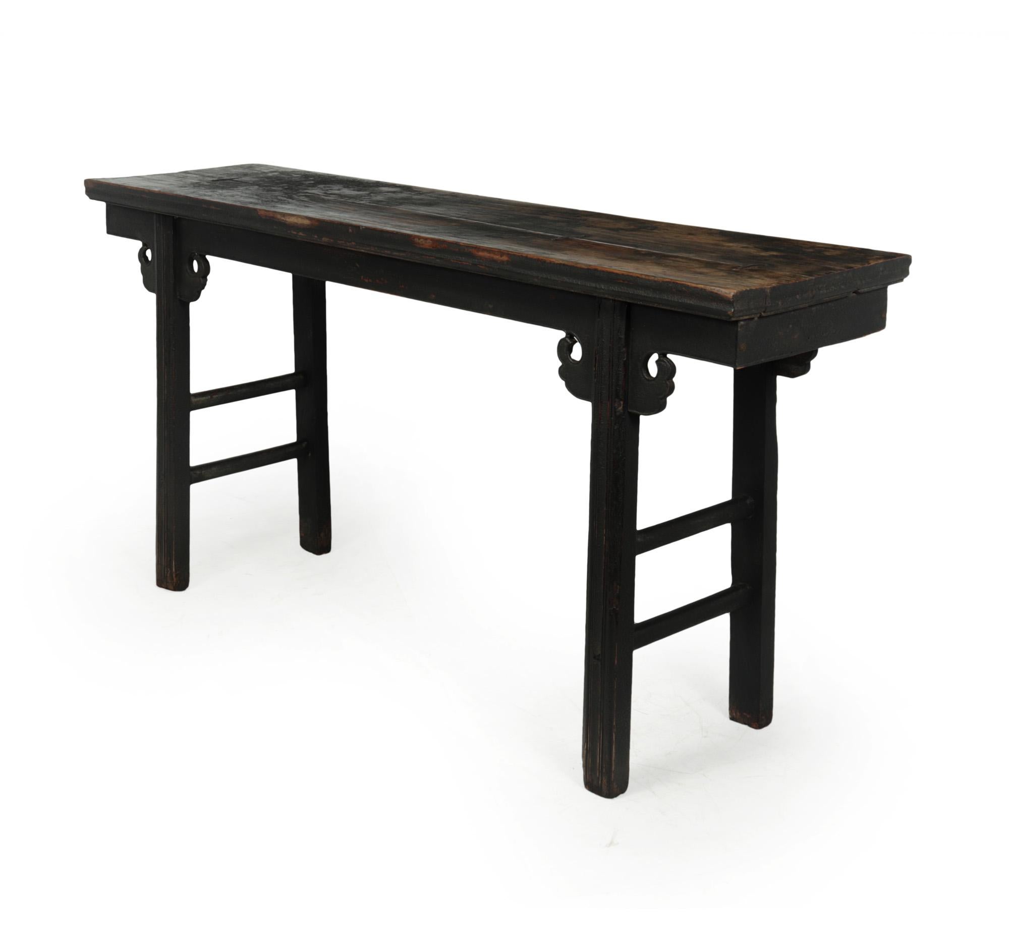 Antique Chinese console table
Produced in the Shanxi province northern china around 1840 – 1860 in solid elm, with red and black lacquer. This has losses and great wear on the top and around the legs. The table has clean and elegant lines with