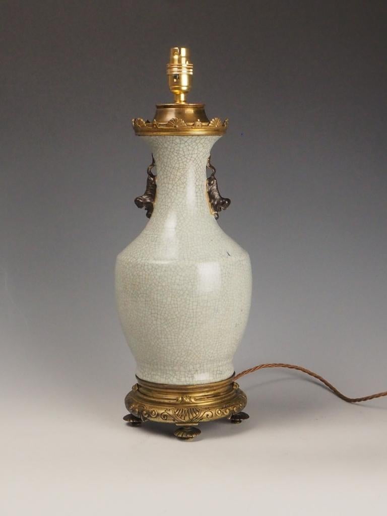 Bronze Antique Chinese Crackle Glaze Lamp with Foo Dog Motifs For Sale