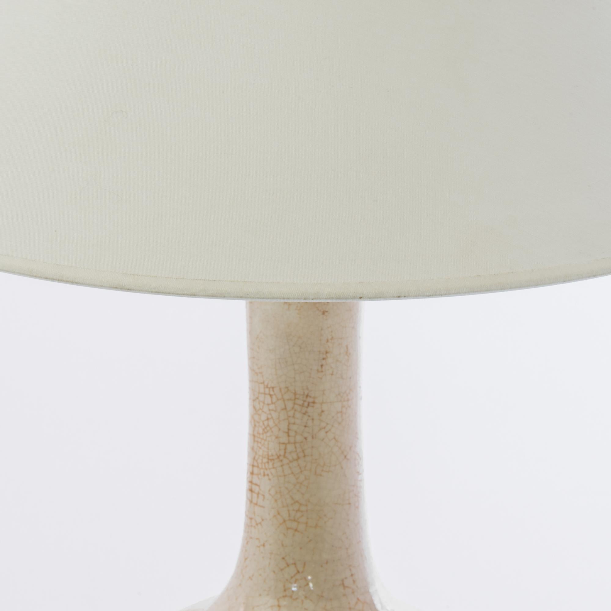 This finely crafted vintage Chinese vase has been fitted with an adjustable brass fixture and E26 lighting socket. Textured glazes, attractive colors and clean modern forms make this a great fit for neutral contemporary interiors. 29.1