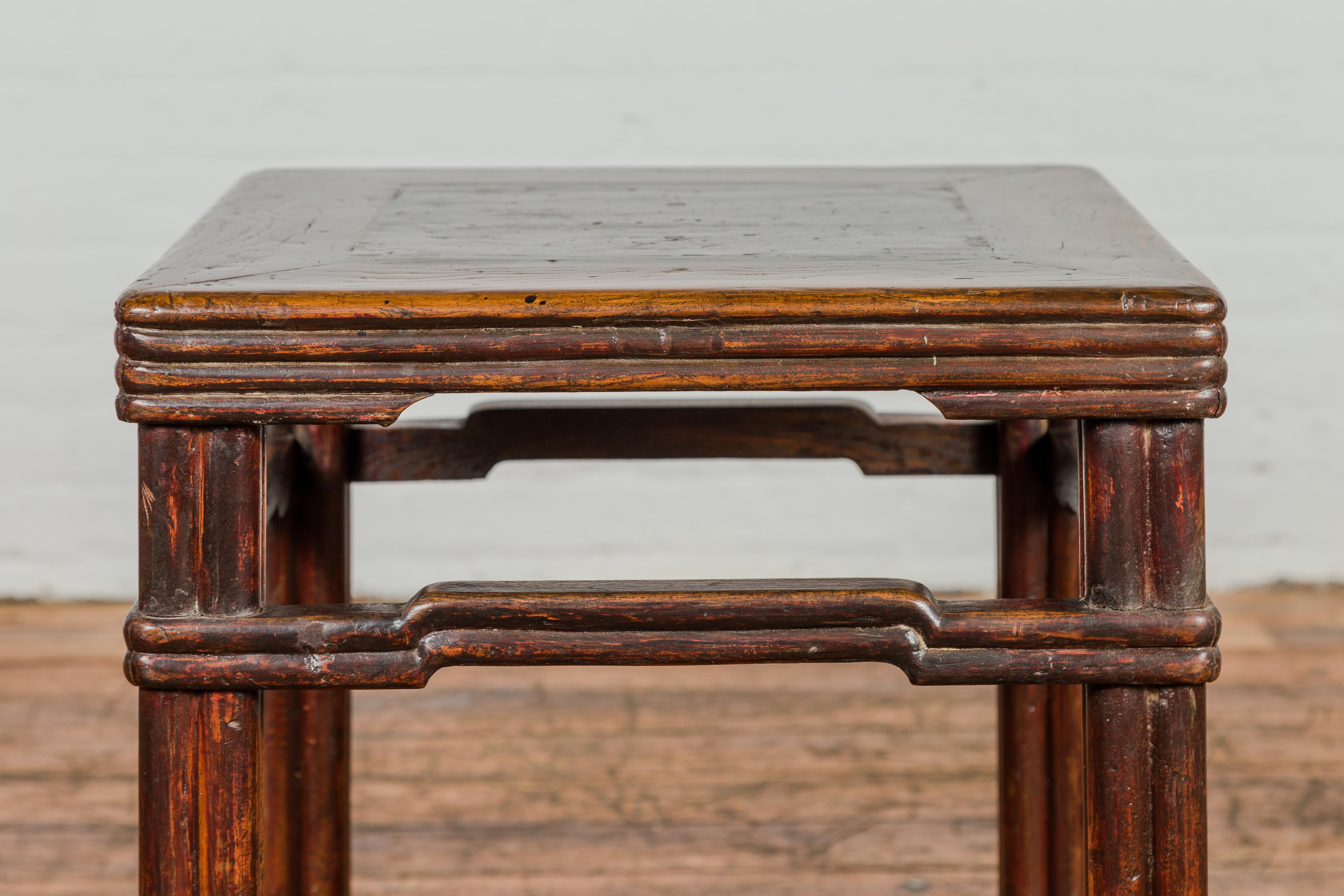 Carved Antique Chinese Dark Brown Side Table with Reeded Humpback Stretchers For Sale
