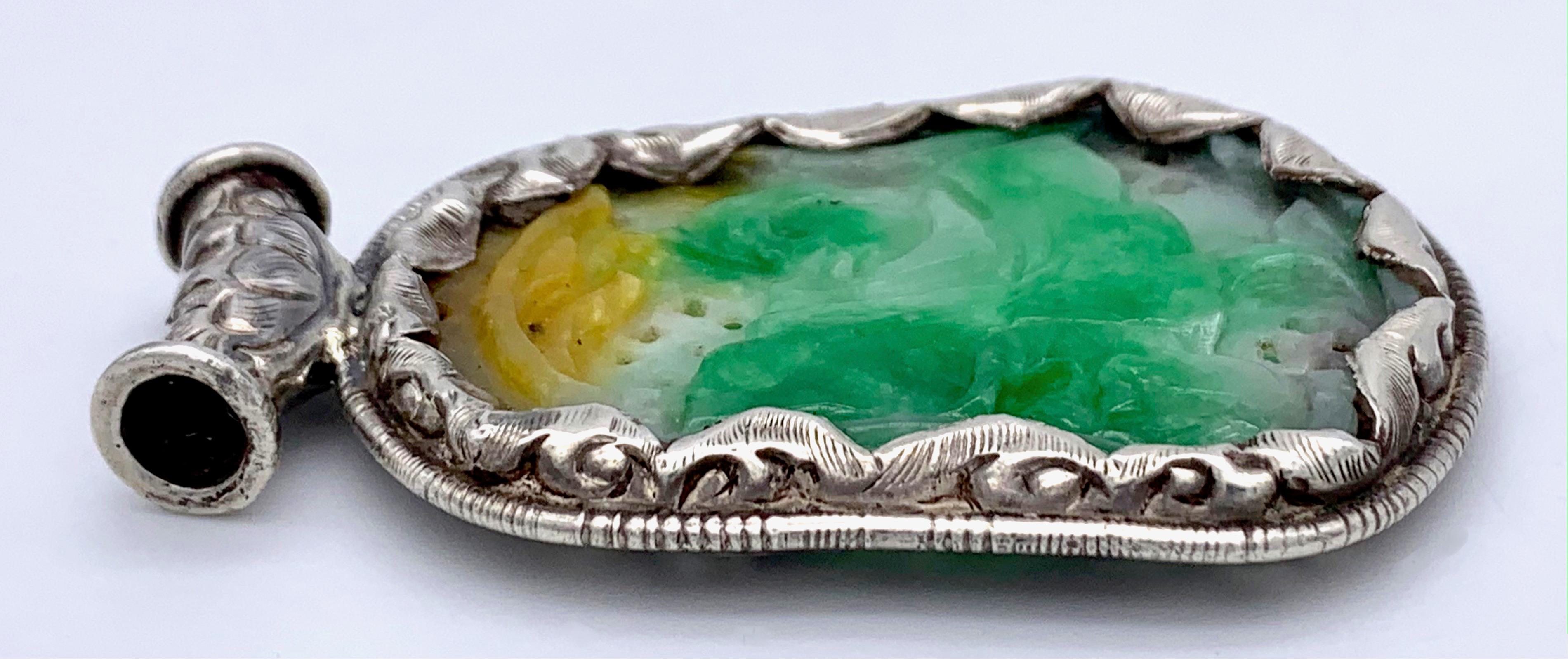 Mixed Cut Antique 19th Century Chinese Double Sided Carved Jade Pendant Silver Mount For Sale