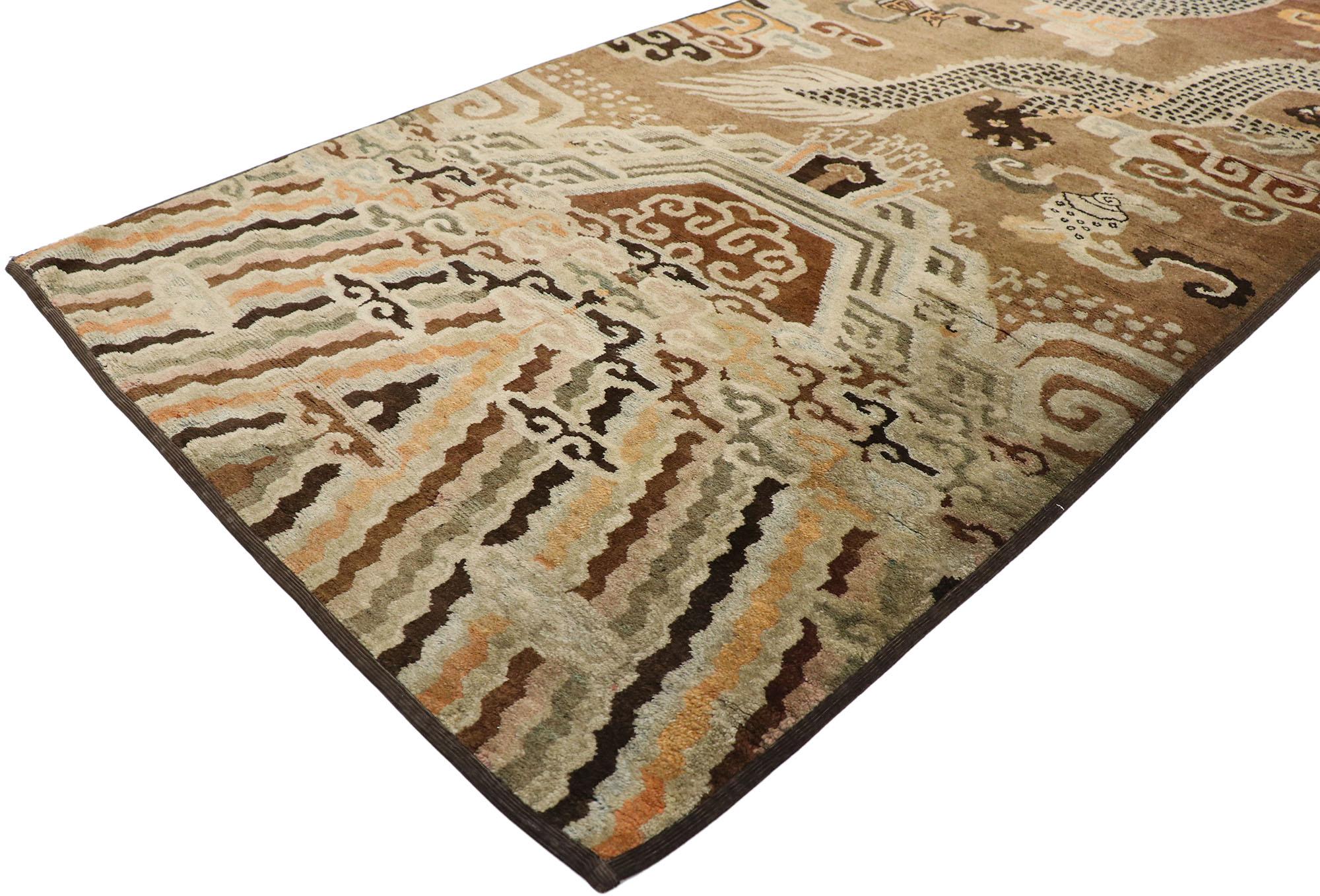 53479 Antique Chinese Ningxia Pillar Rug 03'05 x 14'01.
The interplay between the piece’s various decorative elements gives the composition a great deal of movement and visual interest while also creating a strong sense of story in this hand-knotted