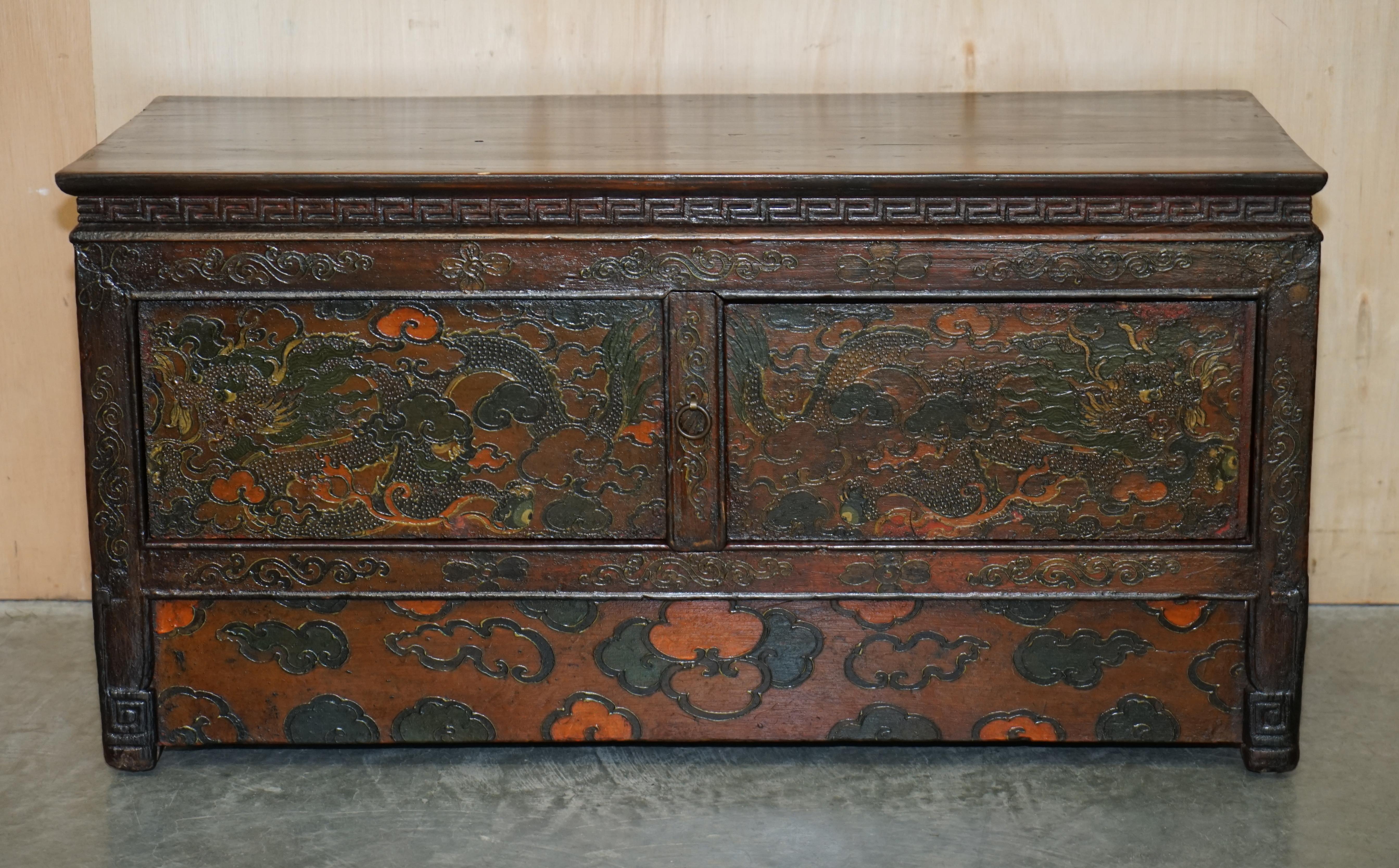 We are delighted to offer for sale this absolutely stunning, highly decorative, Antique Tibetan, Polychrome painted side table sized cupboard

This is a very good looking and well made piece of art furniture. It is the best kind of antique because