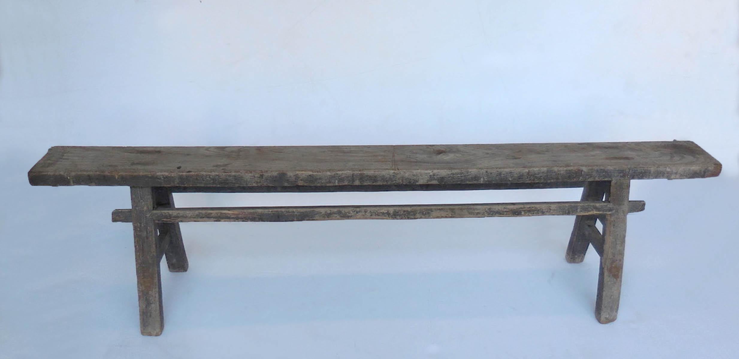 Antique Chinese elm bench. Mortise and Tenon construction. Love old weathered and worn natural patina.
         