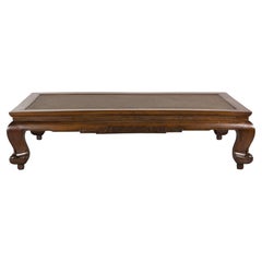 Antique Chinese Elm Opium Bed Coffee Table with Woven Rattan Top and Scroll Legs