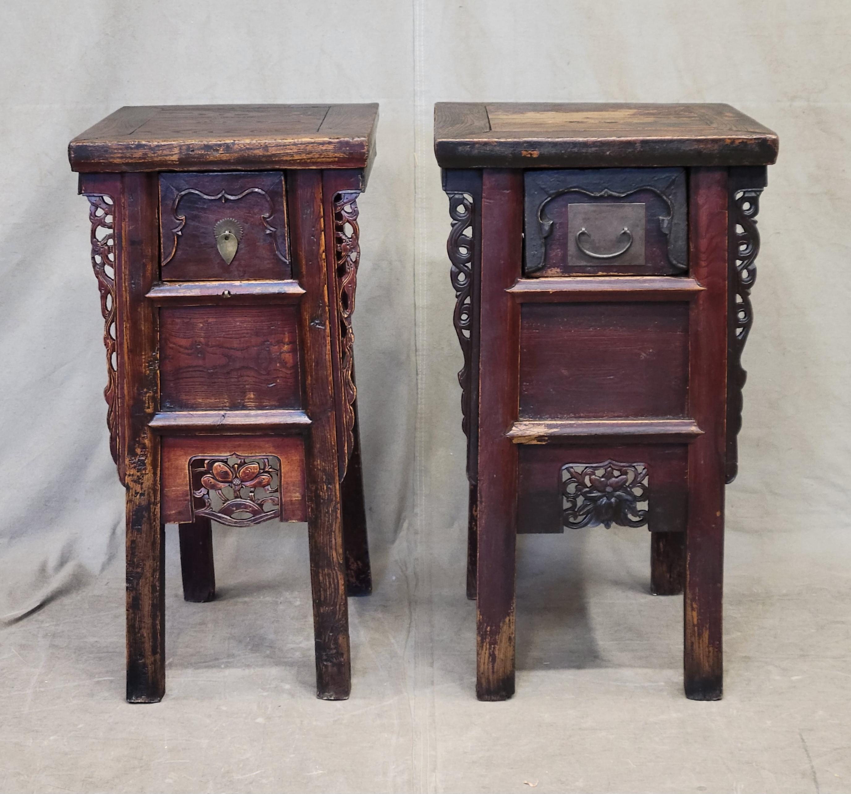 A stunning near pair (not a perfect match but close enough to use together) of antique Chinese elm side tables. This form is often called an alter table and is typically larger. This is a smaller version which is unusual and makes this near pair
