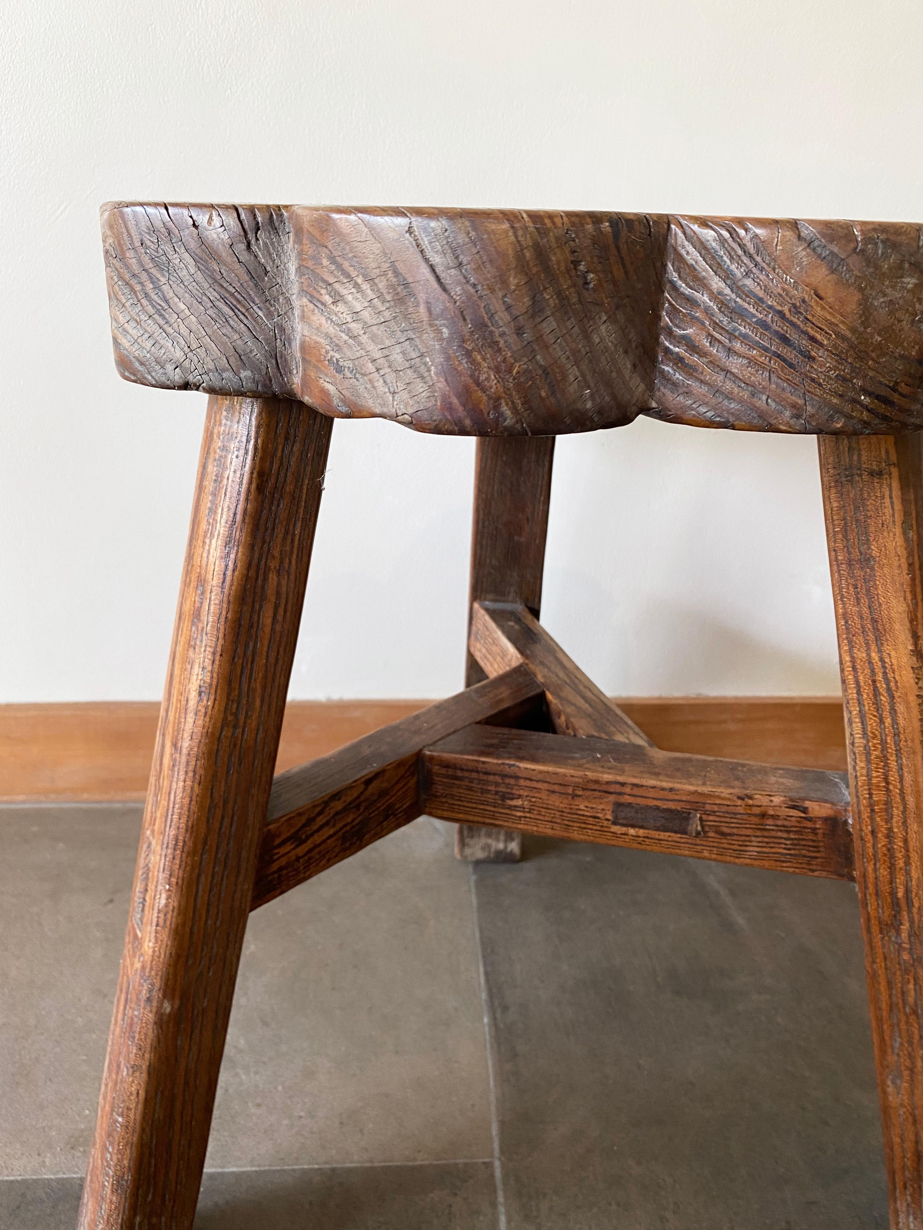 Hand-Crafted Antique Chinese Elm Wood Stool with Floral Wood Detailing, Early 20th Century
