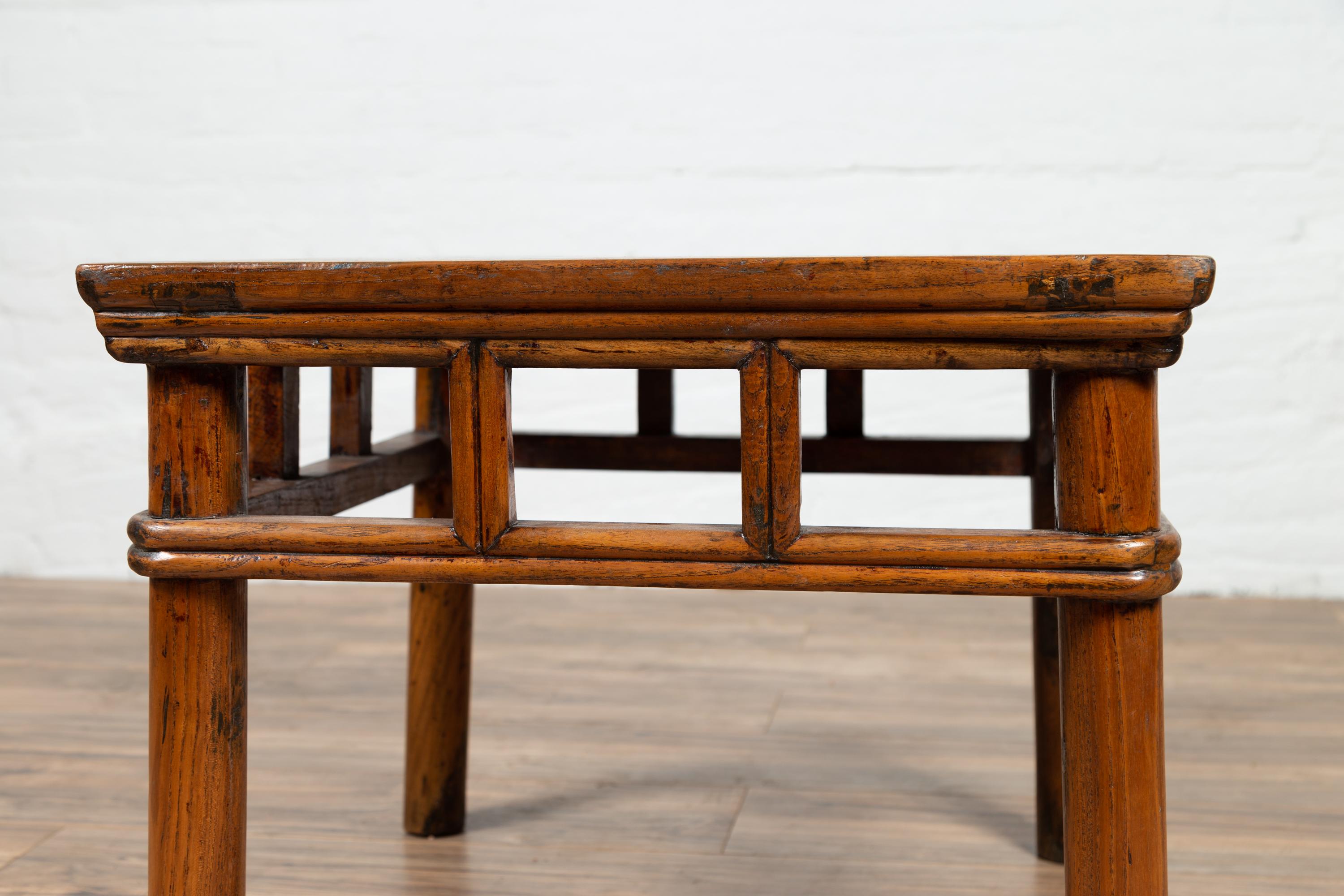 Qing Antique Chinese Elmwood Table with Pierced Apron and Pillar-Shaped Struts Motifs