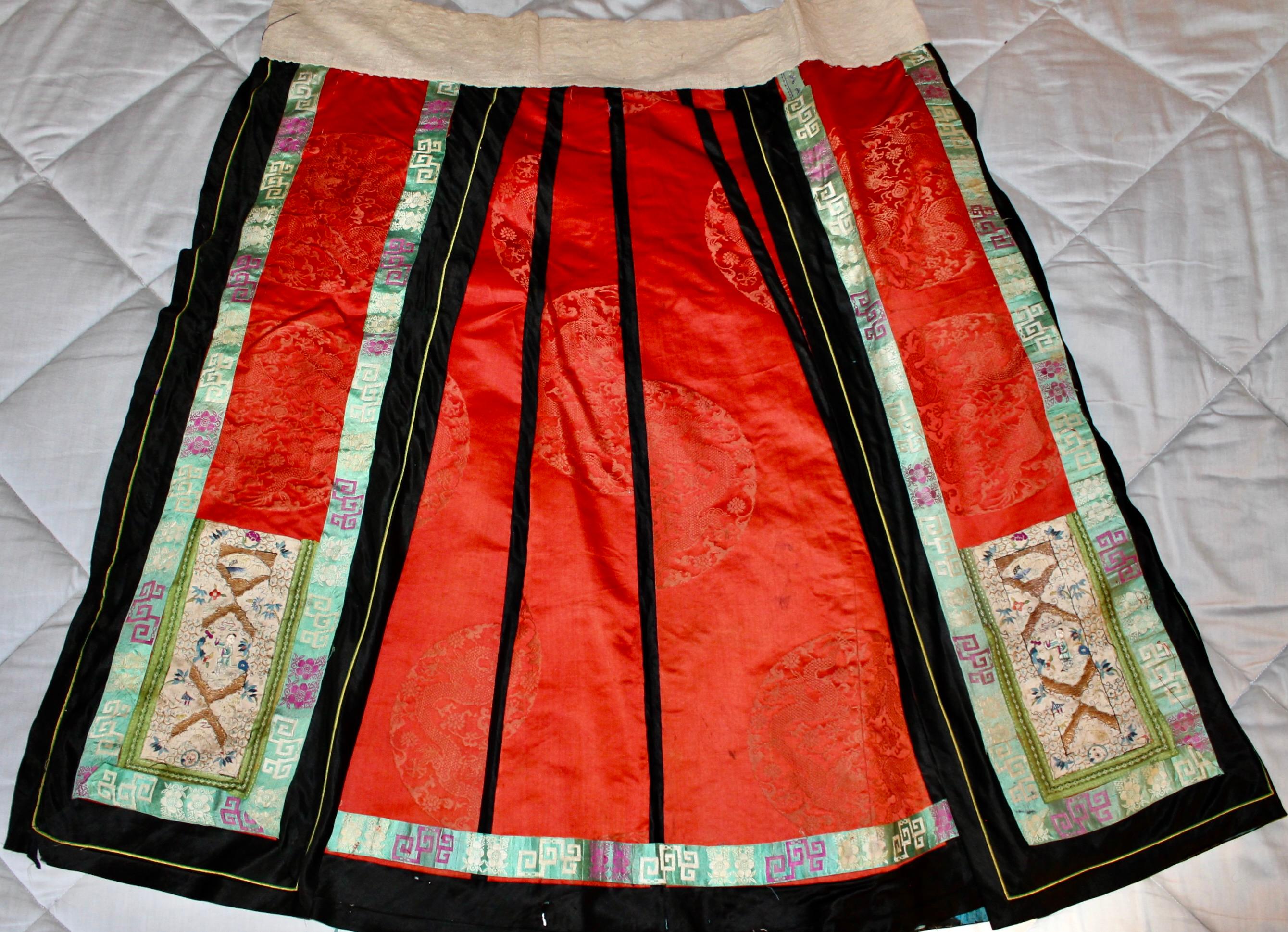 A late 19th century Qing Dynasty embroidered silk wedding skirt. Total waistband measures 44