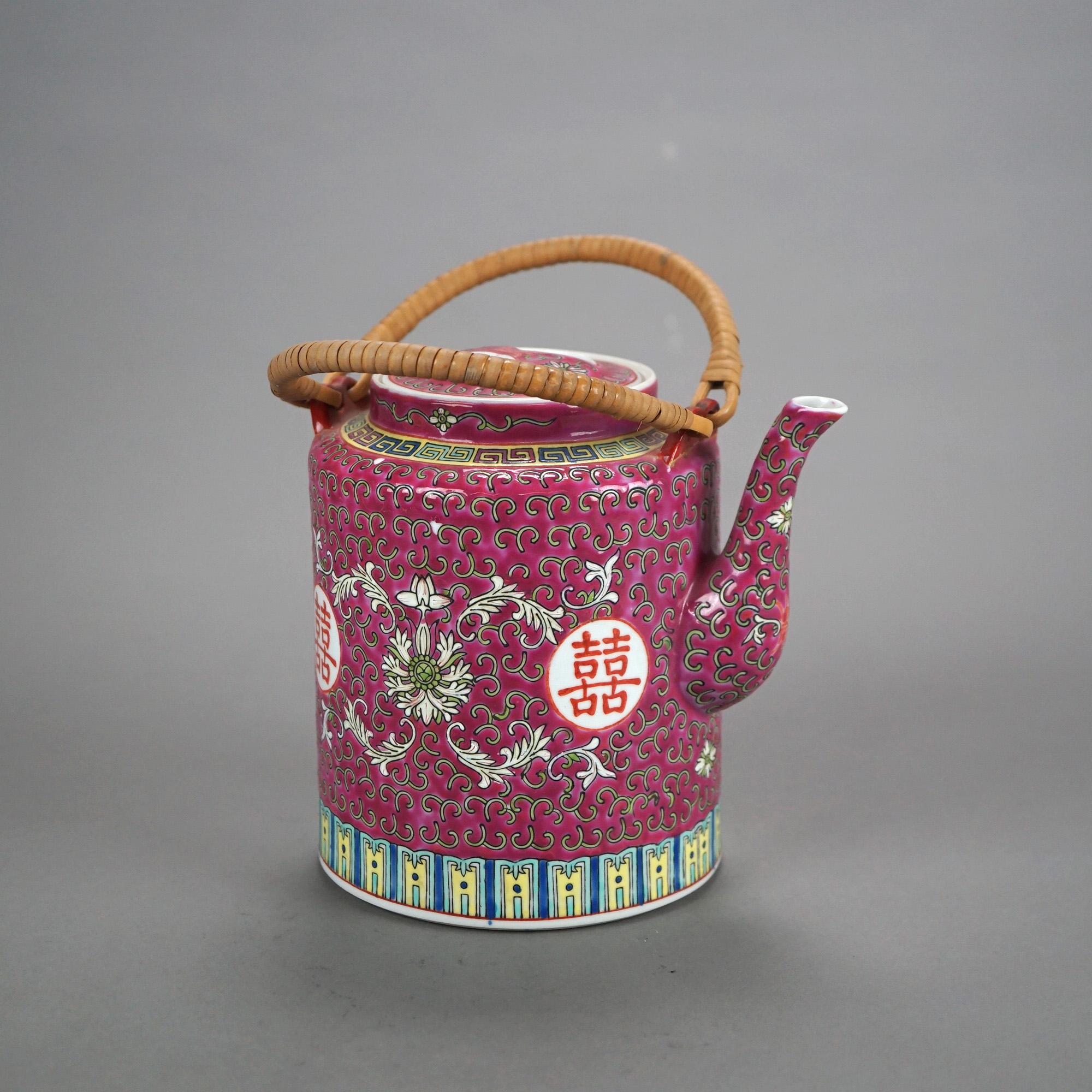 79124Antique Chinese Enameled Porcelain Teapot with Rams Horns, Foliate Elements and Characters C1920

Measures - 9 1/4