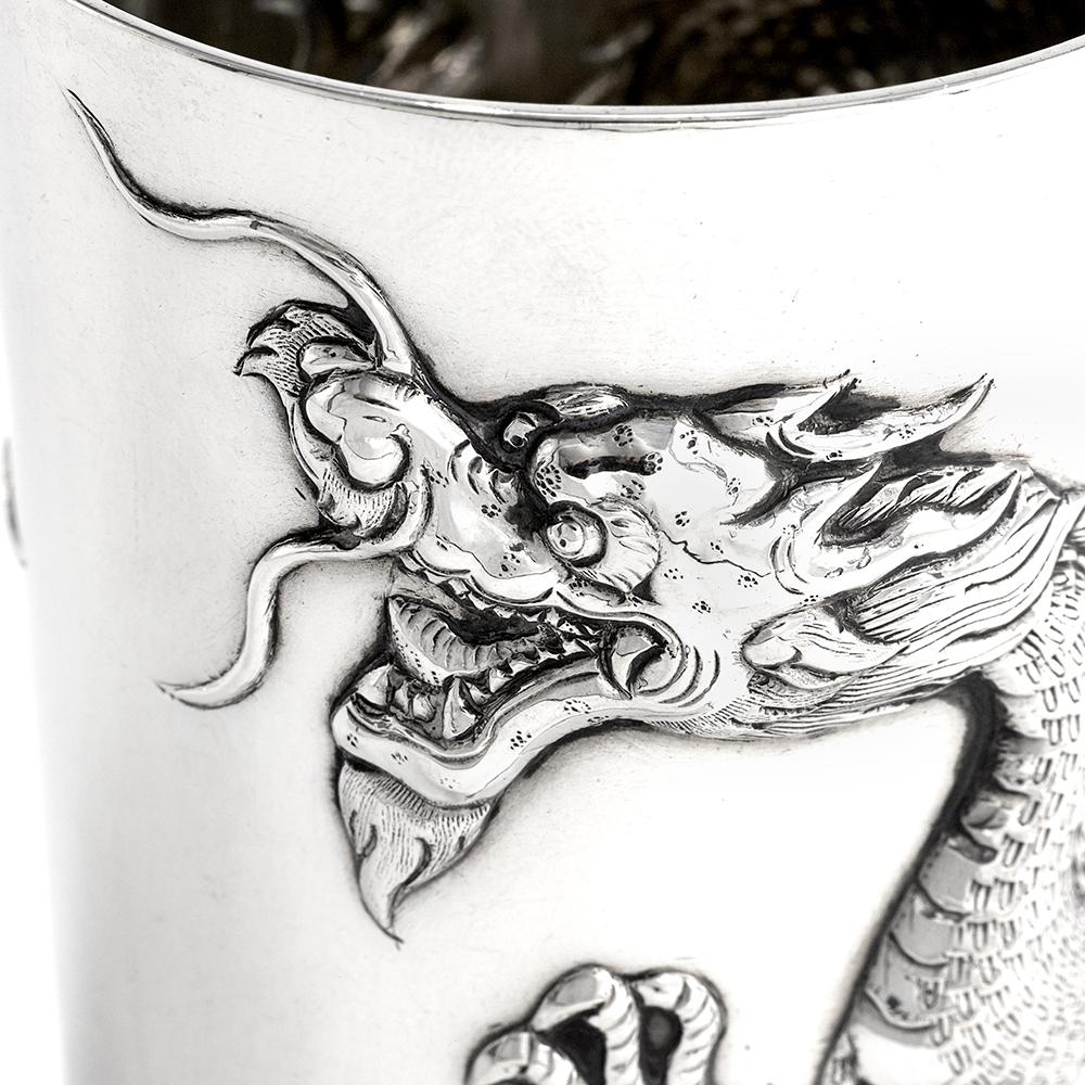 A fine antique Chinese export solid silver dragon beaker of cylindrical tapering form, with an impressive embossed dragon design, with clear hallmarks to the underside. 

Maker: Luen-Wo
Origin: Shanghai, China,

circa 1900

Weight: 84.5.