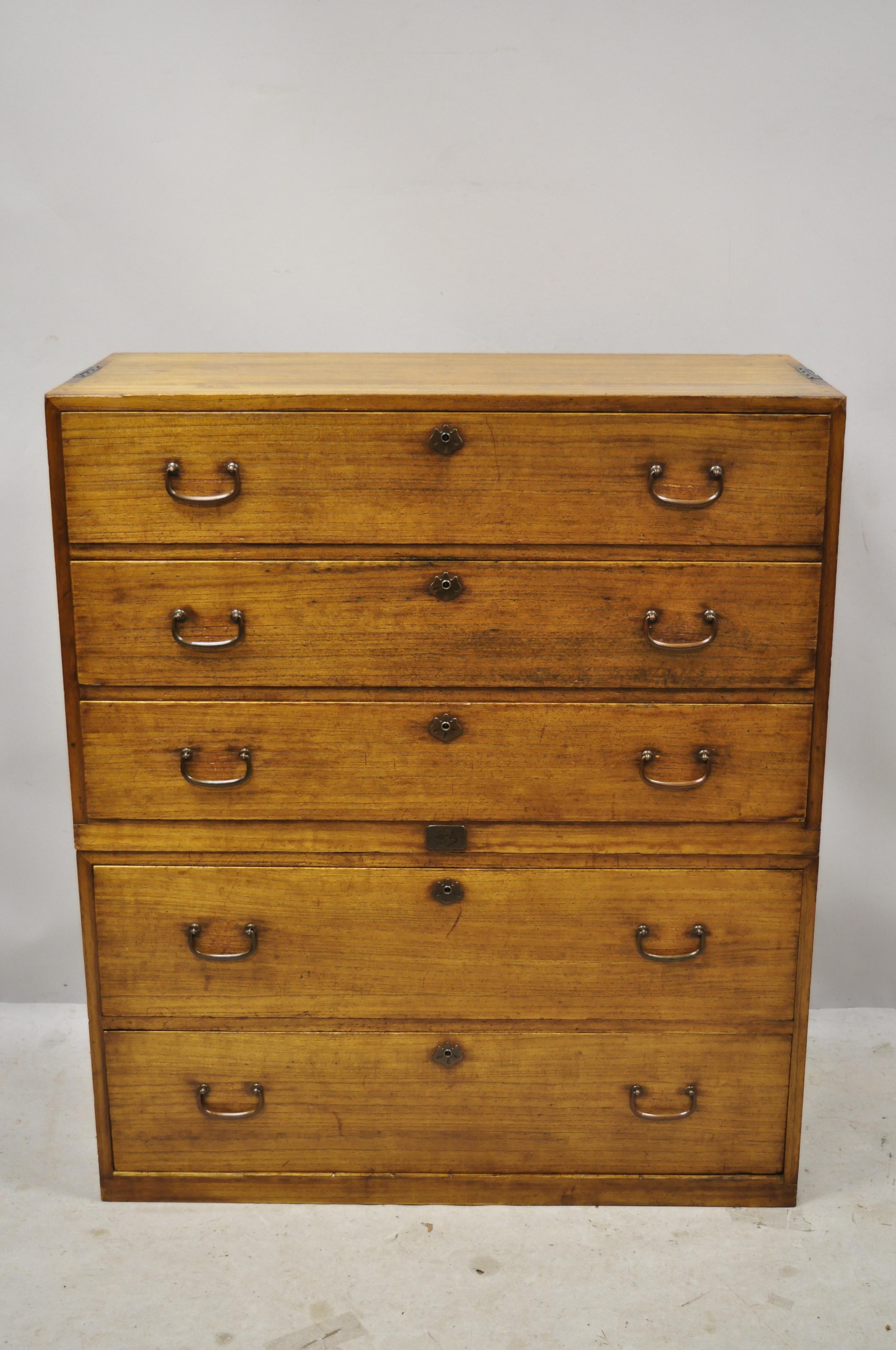 Antique Chinese Export Colonial Camphorwood stacked Campaign chest dresser. Item features iron handles, beautiful wood grain, 2 part construction, working lock and key, 5 drawers, very nice antique item, great style and form, circa early 1900s.
