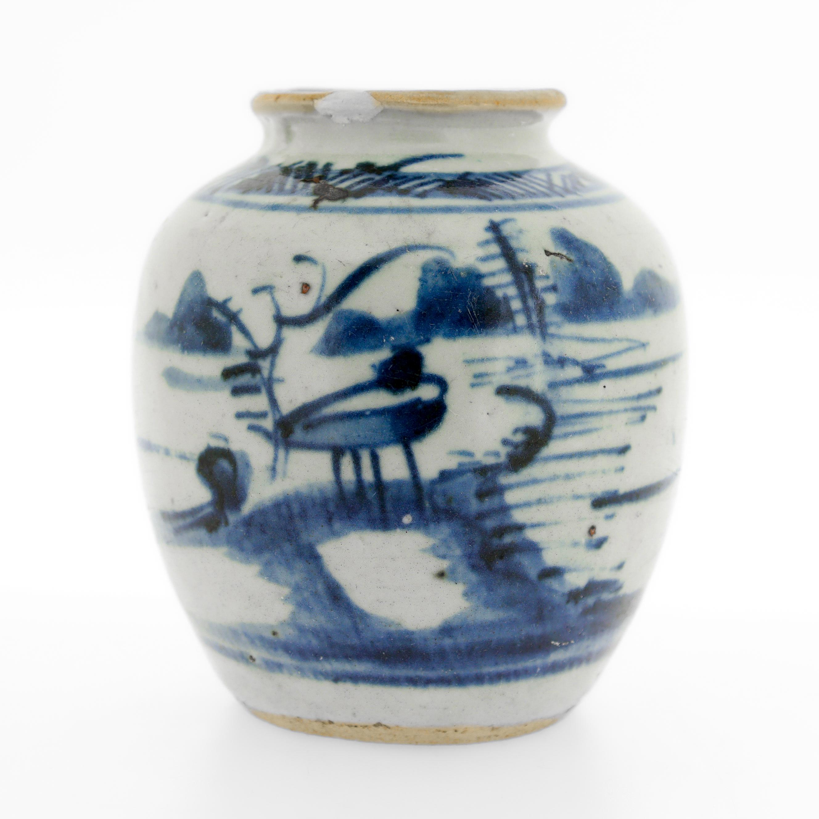 A fine antique-cabinet sized Chinese porcelain ginger jar.

With a creamy blue-white ground and blue painted decoration.

With a landscape scene to the body and a blue stylized diaper patterned border to the shoulder.

Simply a wonderful miniature