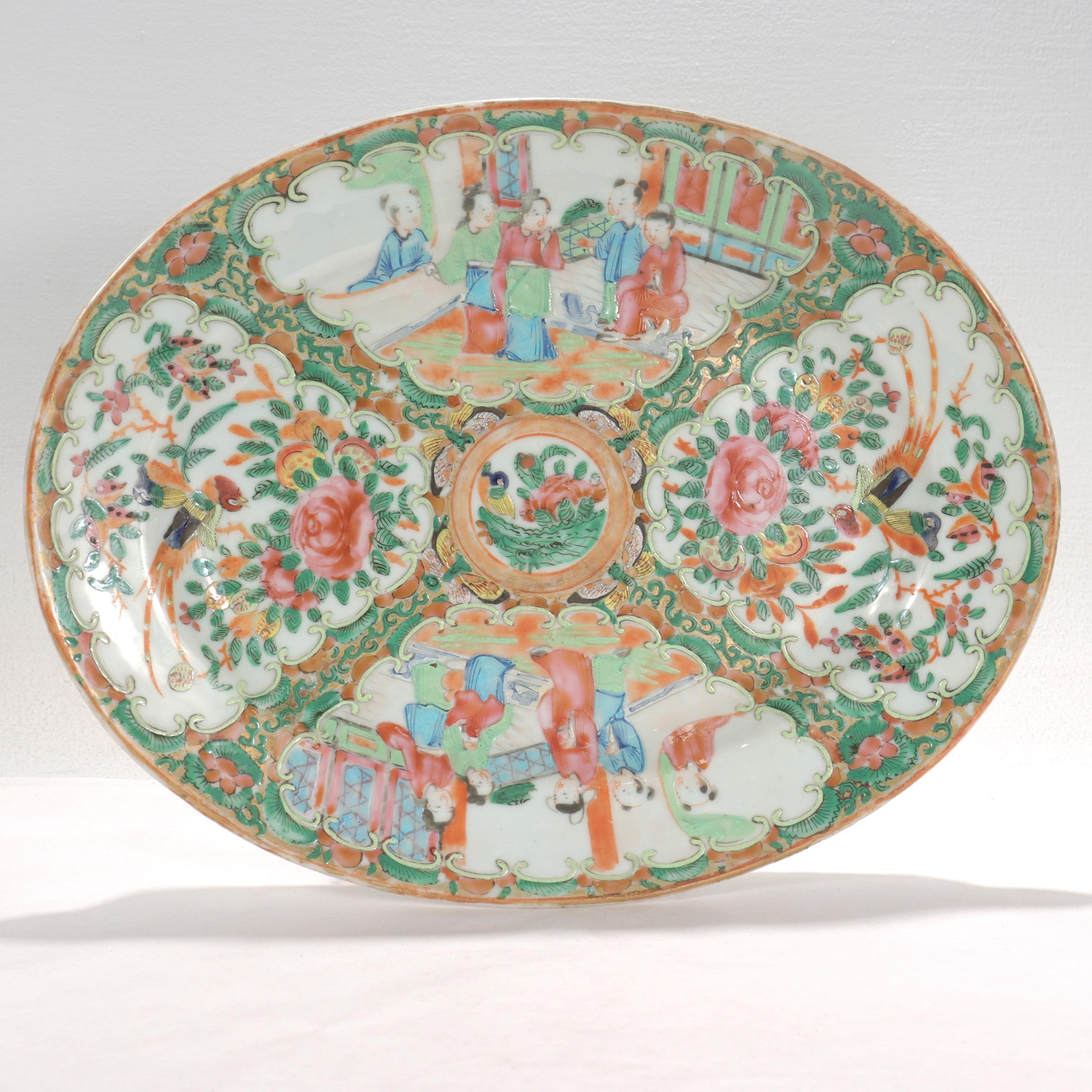 A fine antique Chinese Export porcelain

In the Rose Medallion (Famille Rose) style.

The central cartouche of the bowl depicts a floral scene. Both the interior and exterior walls of the bowl have 6 cartouches which each alternate between scenes of