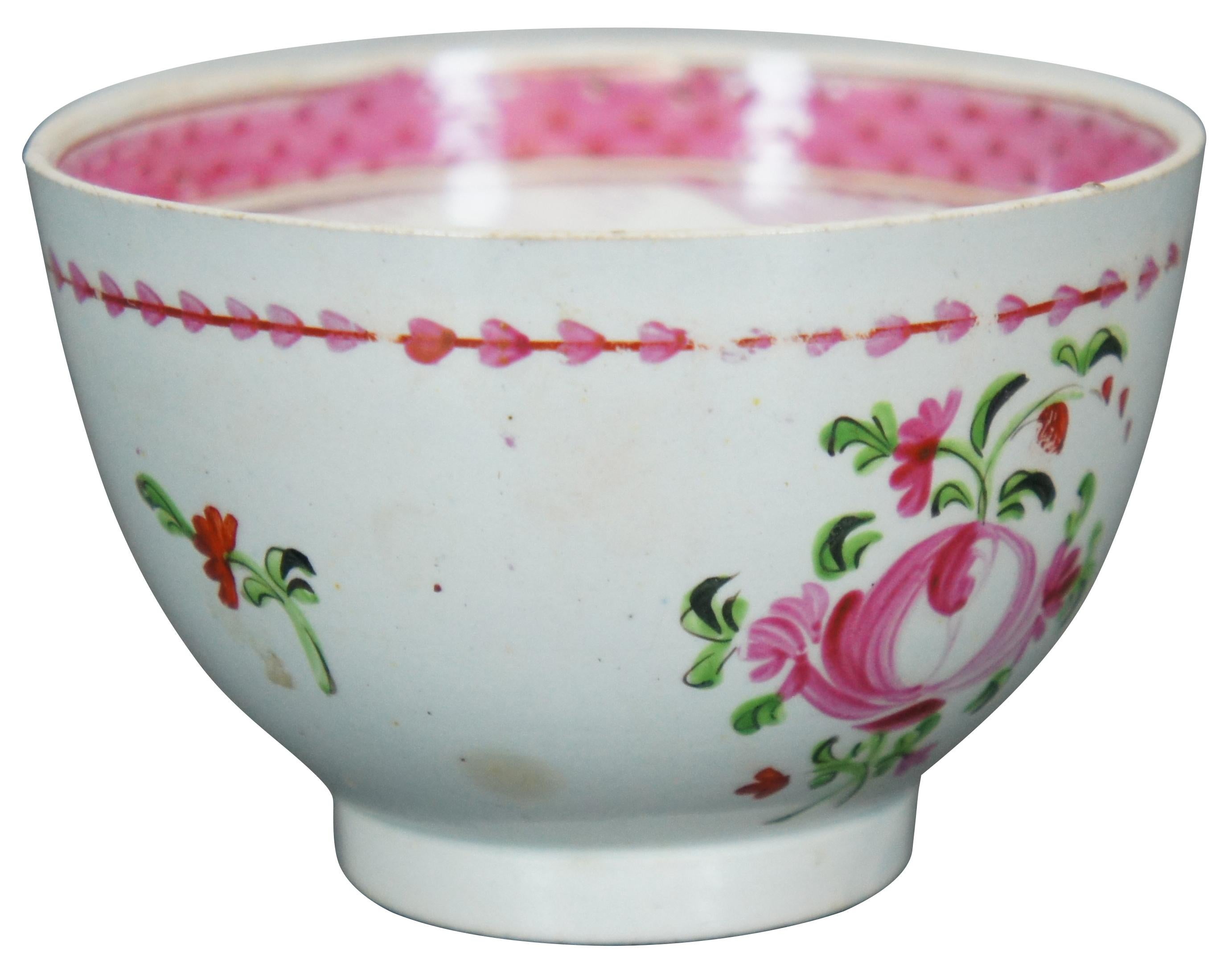 Antique chinese export handle-less tea cup from the Qianlong period (circa late 1700’s) featuring pink lattice and famille rose pattern.