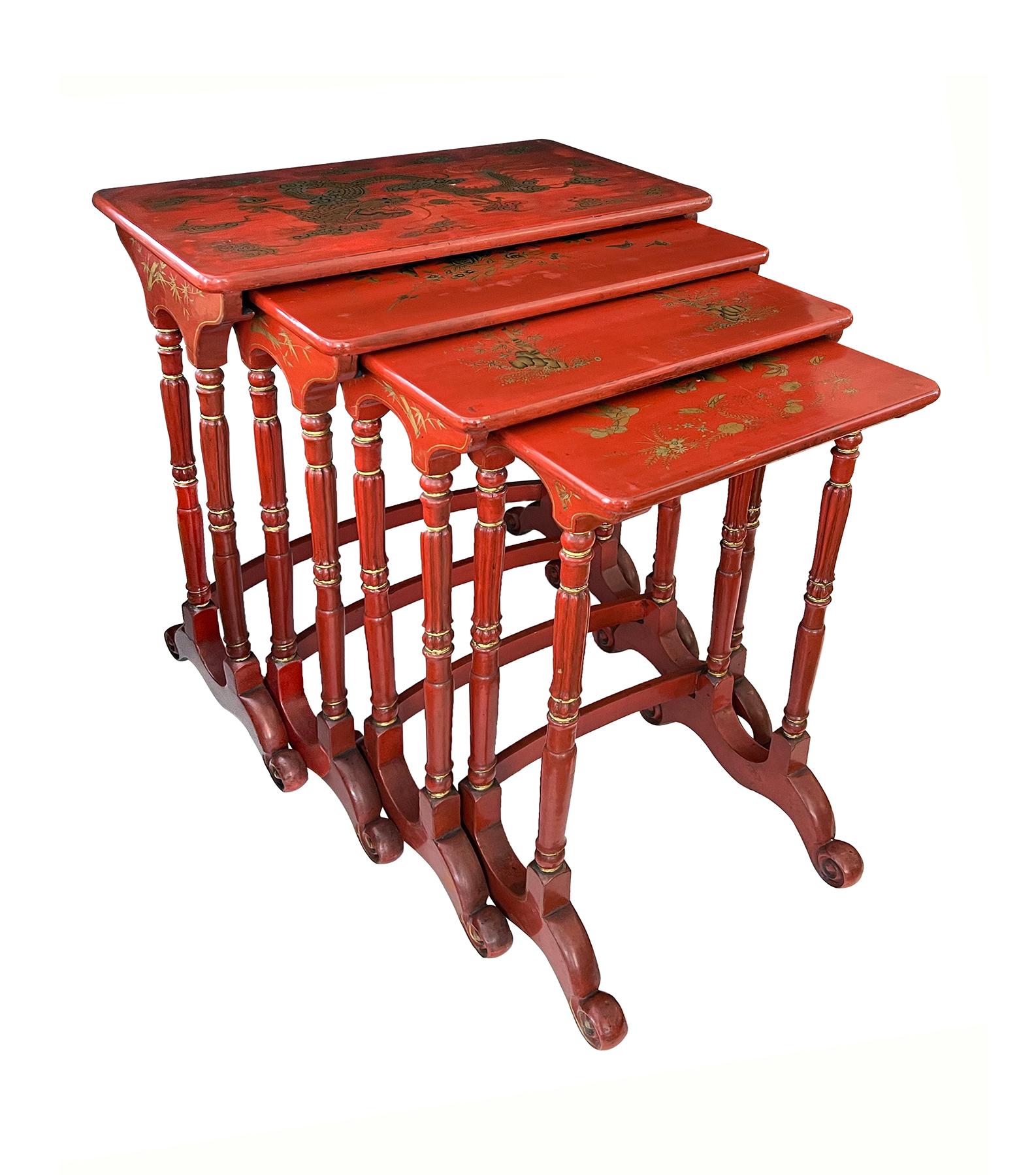 consisting of four graduated rectangular tables raised on double-baluster supports over scrolled feet; each table top decorated with fine gilt decoration featuring a five-clawed imperial dragon, bamboo plants, flower bouquets and various