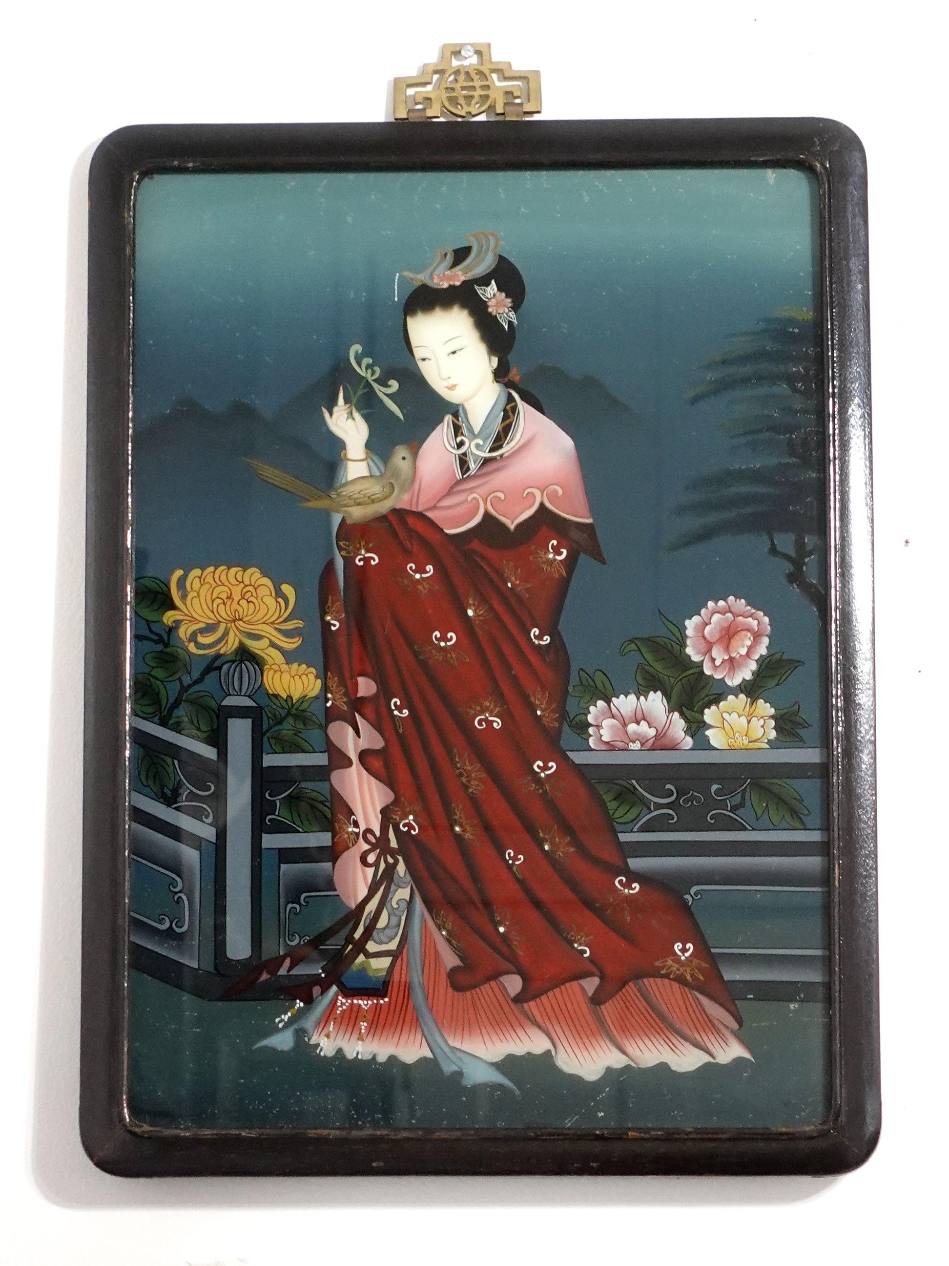 A charming late 19th-century to early 20th-century, Chinese export reverse glass painting, depicting a lady in the garden, playing with a bird. The painting comes with its original hardwood frame and the old pins in the back of the panel.
You may