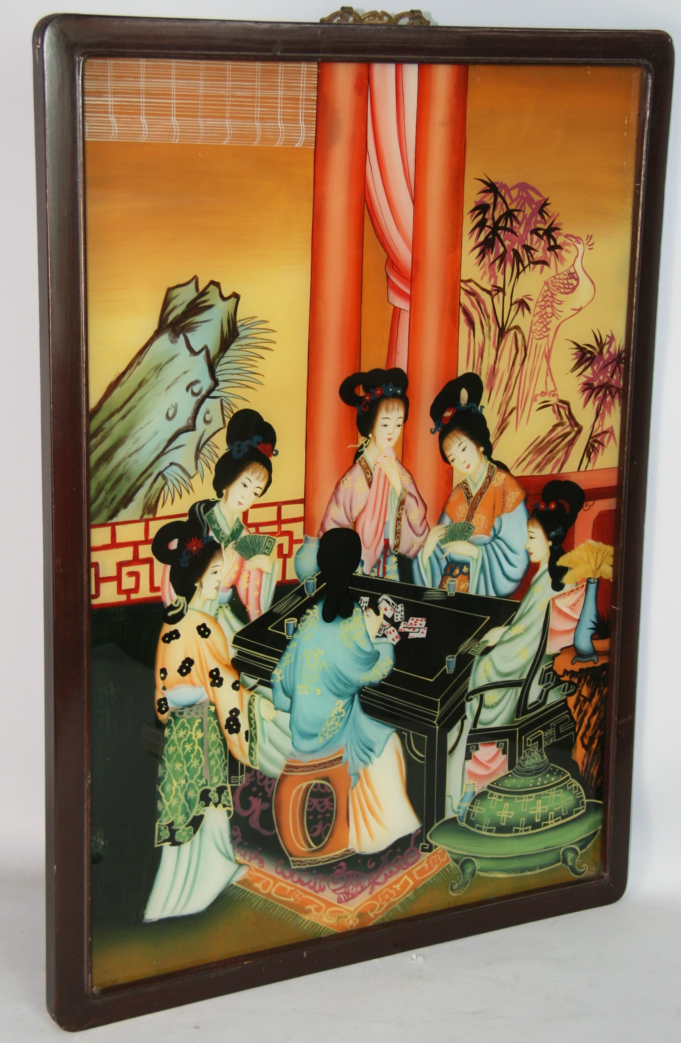 5213 Antique Chinese export reverse painting on glass of a family gathering
Set in a period wood frame
