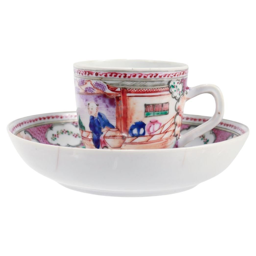 A fine antique Chinese Export porcelain coffee cup & saucer.

In a puce or purple Rose Mandarin variant.

Decorated in polychrome enamels with puce colored cells and embellishments throughout.

Depicting a scene with a woman and two children in a