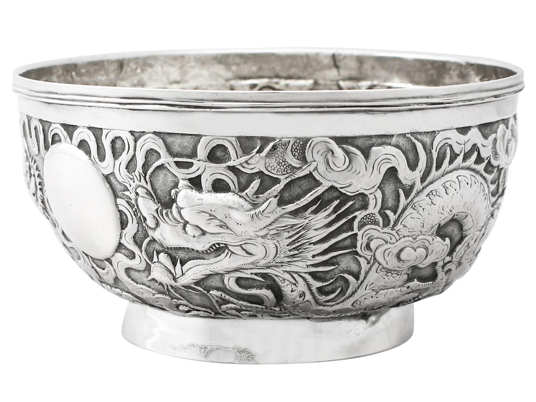 A fine and impressive antique Chinese Export Silver bowl; an addition to our Chinese/Asian silverware collection

This impressive Chinese Export Silver (CES) bowl has a plain circular form onto a plain collet foot.

The body of this antique Chinese