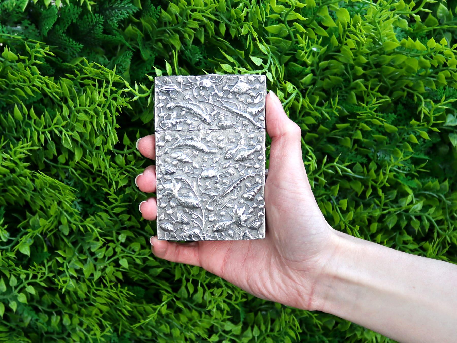 An exceptional, fine and impressive antique Chinese export silver card case; part of our diverse Asian silverware collection.

This exceptional antique Chinese export silver (CES) card case has a plain rectangular rounded form.

The anterior