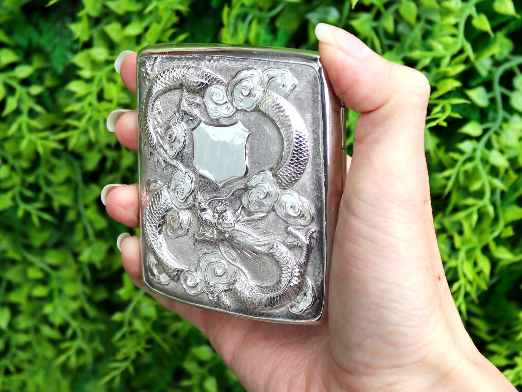 A fine and impressive antique Chinese Export Silver cigarette / card case; part of our diverse Asian silverware collection.

This fine antique Chinese Export Silver (CES) cigarette/card case has a plain rectangular form with rounded corners.

The