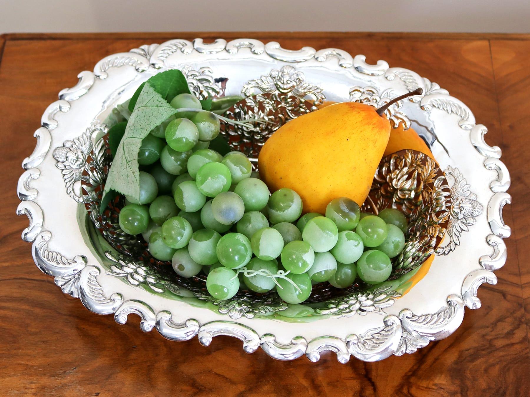 An exceptional, fine and impressive, rare antique Chinese Export Silver dish; part of our Chinese/Asian silverware collection.

This exceptional antique Chinese Export Silver (CES) fruit dish has an oval-shaped form.

The swept sides of the dish are