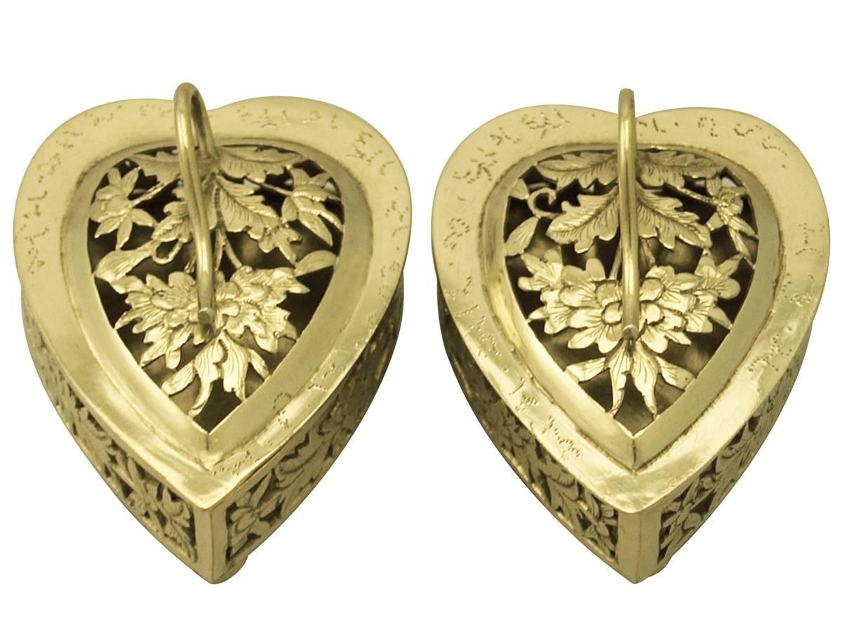 A fine and impressive pair of antique Chinese Export silver gilt heart shaped potpourri boxes; an addition to our ornamental silverware collection.

These fine antique Chinese Export Silver (CES) gilt potpourri boxes have a heart shaped form onto