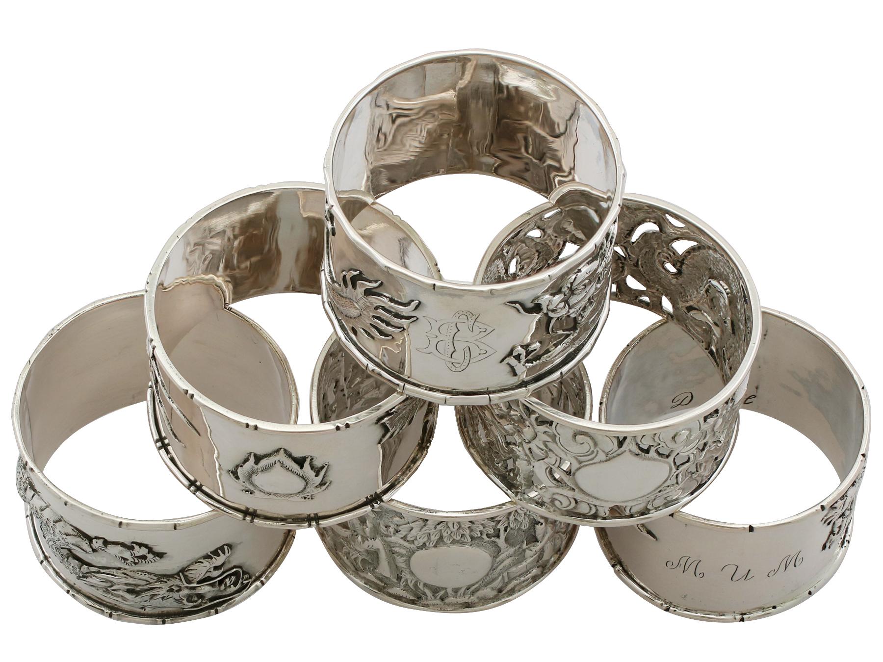 An exceptional, fine and impressive composite set of six antique Chinese export silver napkin rings; an addition to our dining silverware collection.

This exceptional set of antique Chinese export silver napkin rings consists of six napkin rings,