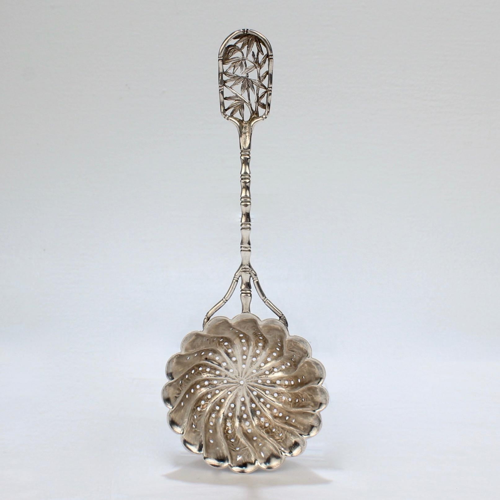 A fine and scarce Chinese Export silver tea strainer.

With fine bamboo leaf openwork to the handle.

Marked to the reverse with Chinese character marks and HC for Hung Chong & Co. of Shanghai and Canton. 

Length: ca. 6 3/4 in.

Items purchased