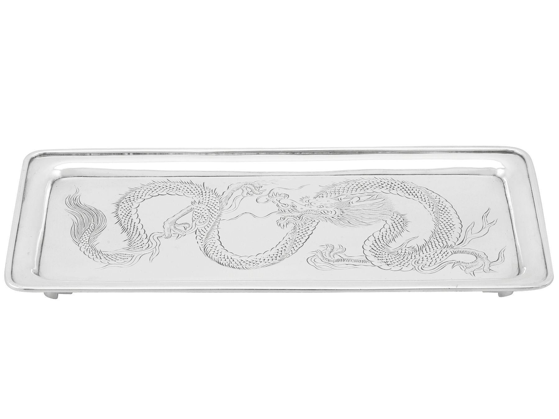 An exceptional, fine and impressive antique Chinese Export silver pen tray; an addition to our ornamental silverware collection

This exceptional antique Chinese Export Silver (CES) tray has a plain rectangular form with rounded corners.

The