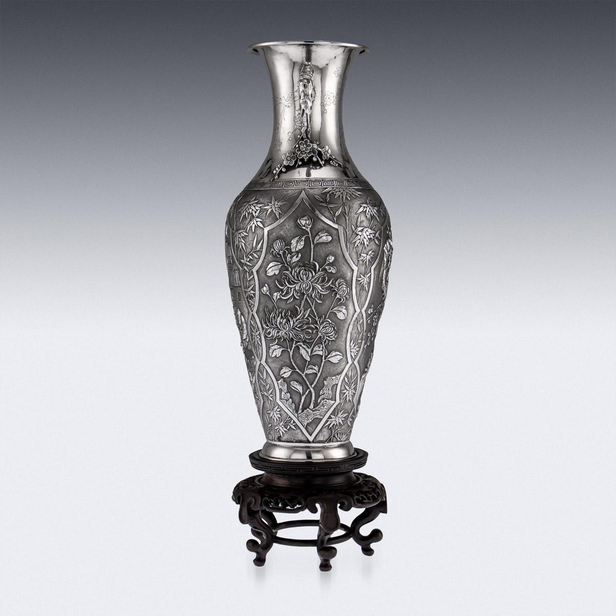 Antique 19th century Chinese Export solid silver vase on Stand, impressive and exceptionally Fine, of baluster form, the body showing a compendium of the finest techniques and styles used in Chinese Export Silver; the body decorated with four sharp