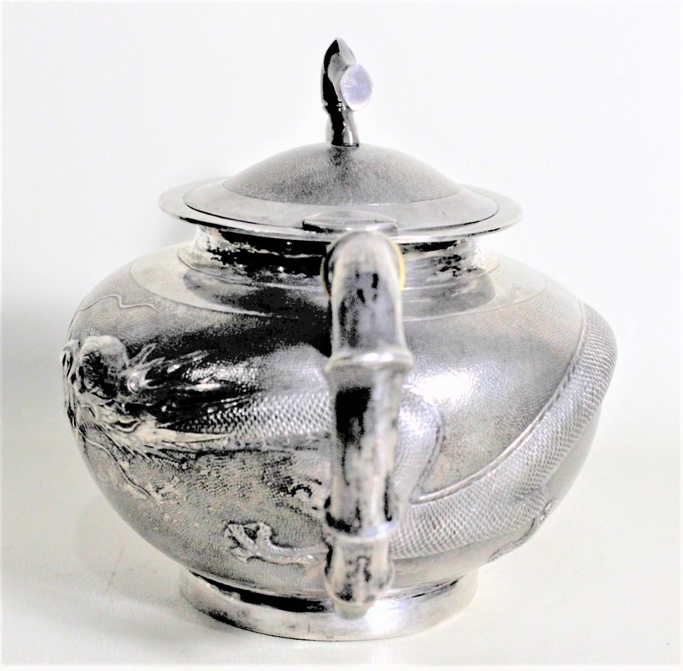 Hand-Crafted Antique Chinese Export Sterling Silver Tea Set with Dragon & Bamboo Decoration For Sale