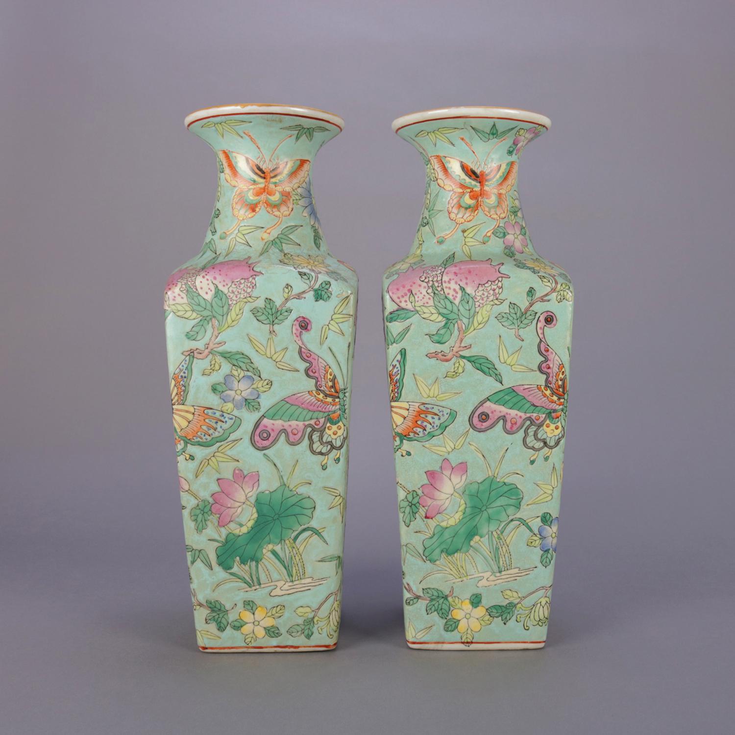 Pair of antique Chinese Famille rose porcelain vases feature block form bases with flared mouth, hand painted overall butterfly garden design, chop mark signed on bases, circa 1900

Measures - 16
