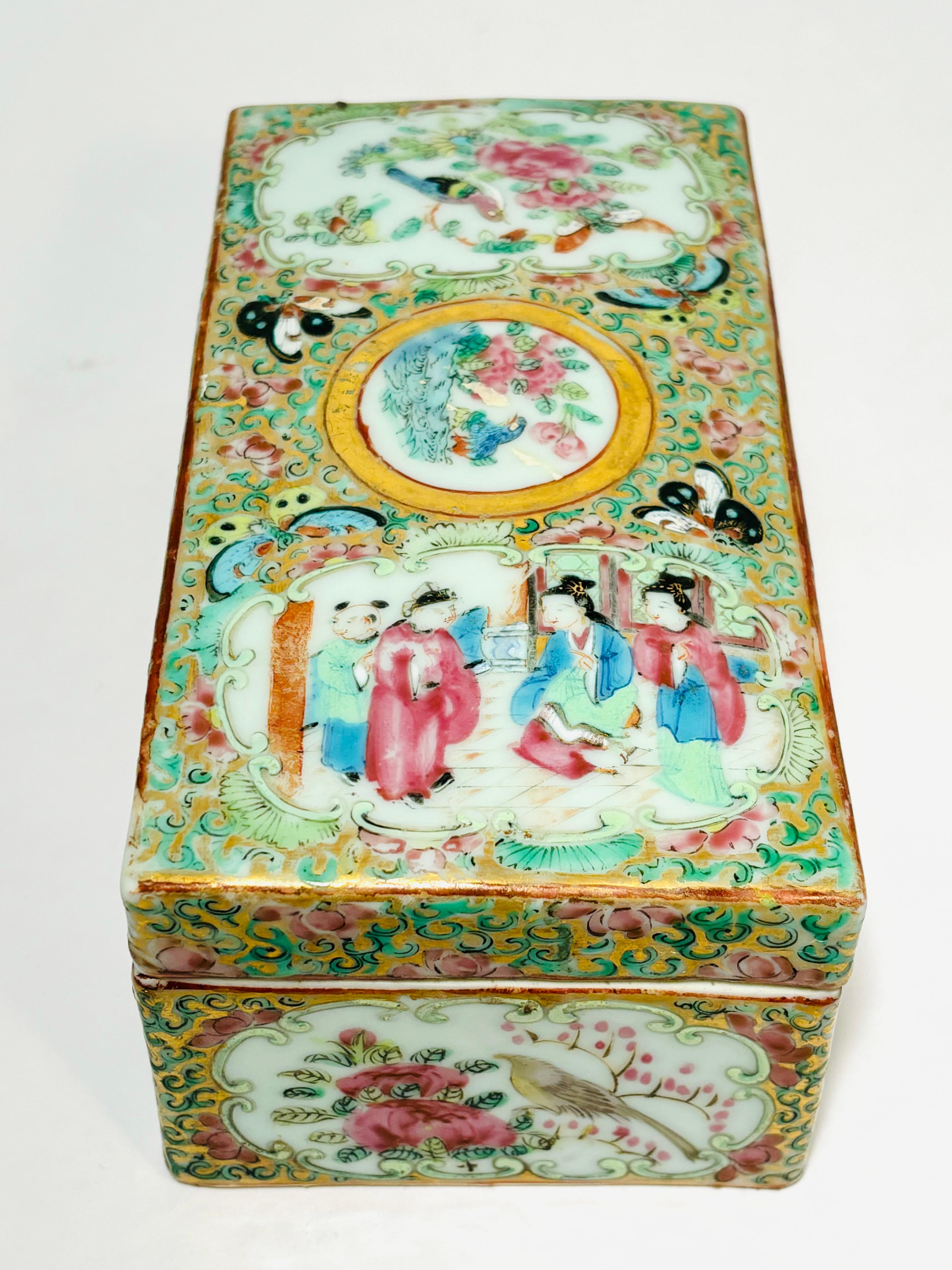 A finely made and hand enameled box with its cover, possibly for a desk or dresser top. Divided on the inside and in very good shape. Lovely cartouches of classic Chinese scenes and flora fauna. Colors remain crisp and vibrant